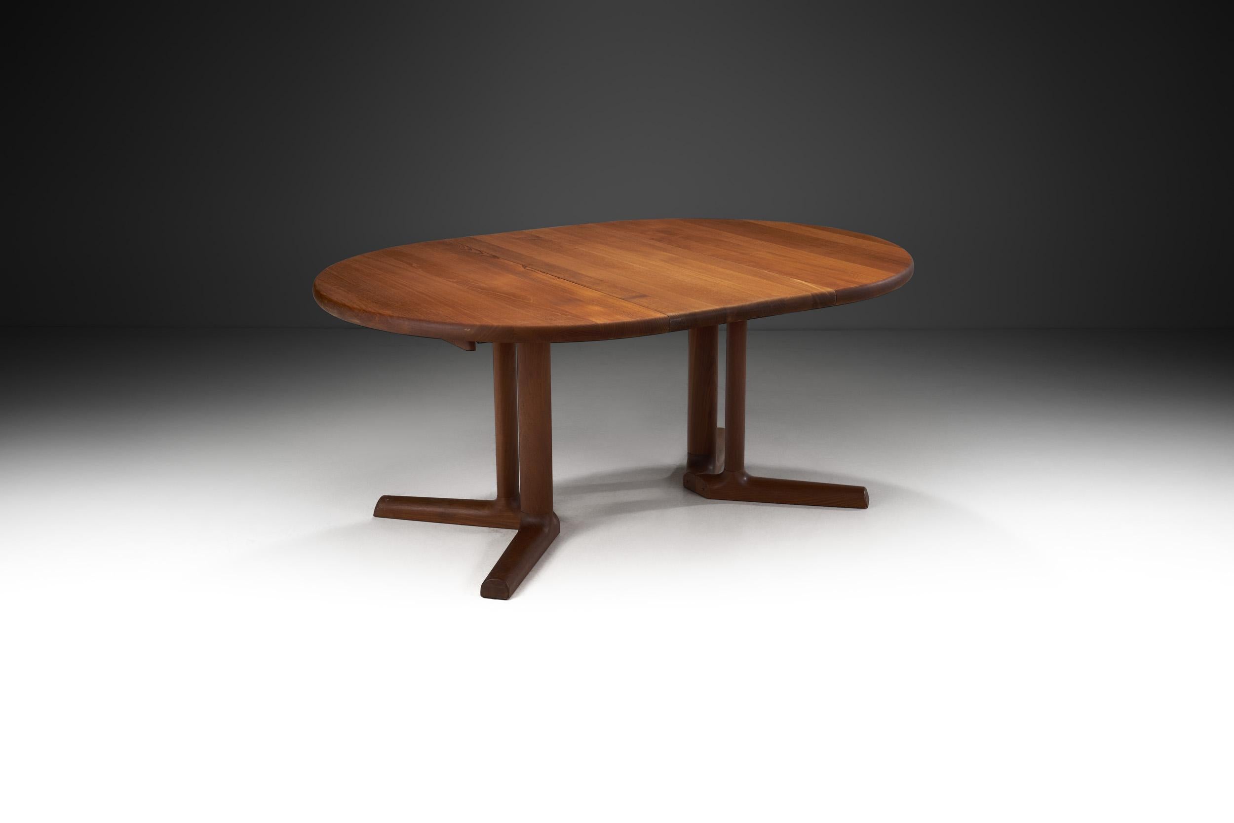 Precious woods and hand finishing define the furniture pieces made by the Danish company, Dyrlund. As this stunning solid teak table shows, great emphasis is placed on skilled craftsmanship with experts who work in the old craftsmanship