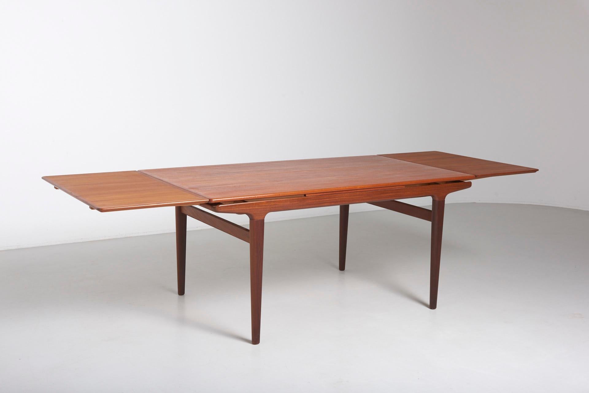 Danish Extendable Teak Dining Table by Johannes Andersen for Uldum Møbelfabrik