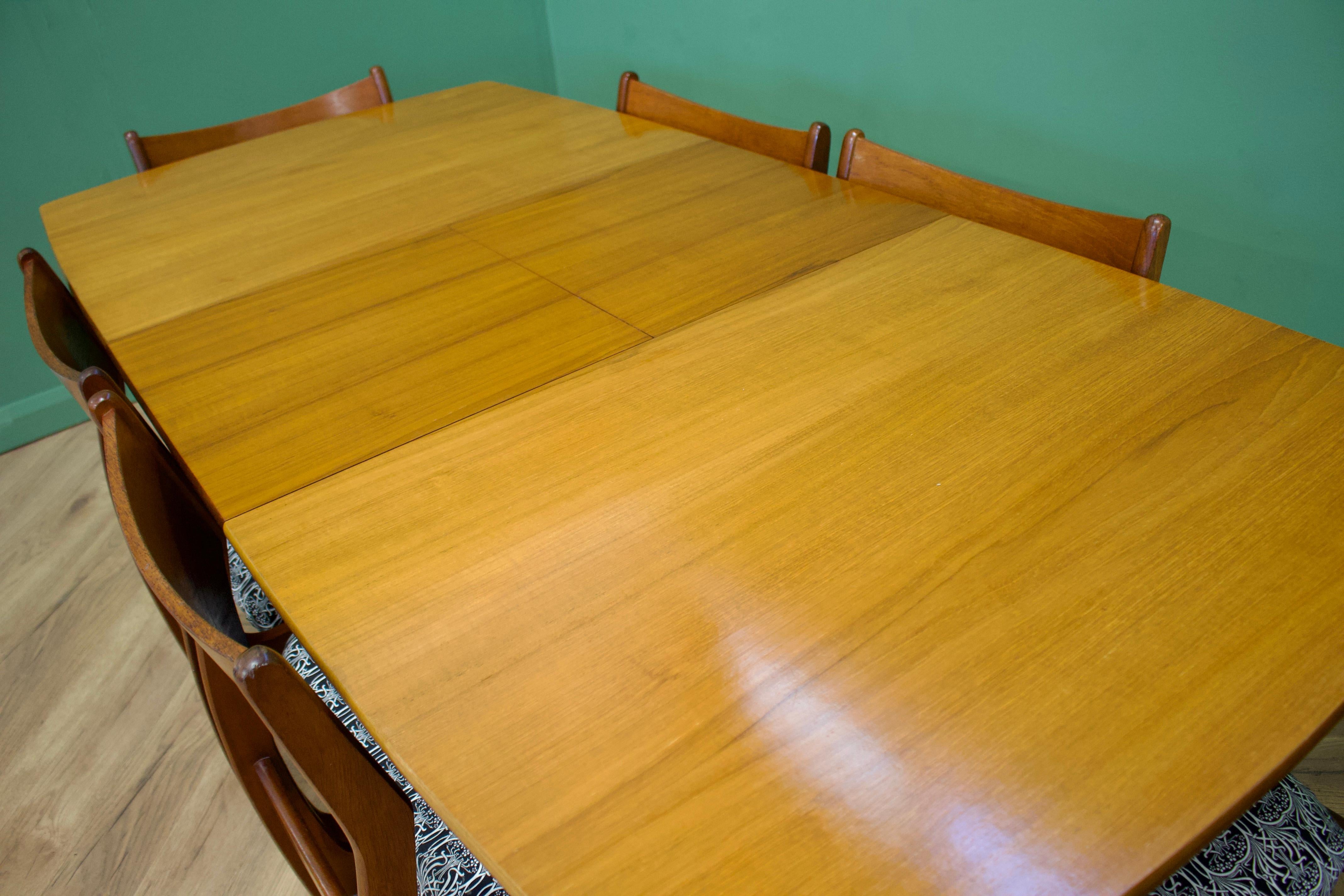 British Extendable Teak Dining Table & Chairs from Portwood, 1960s, Set of 7