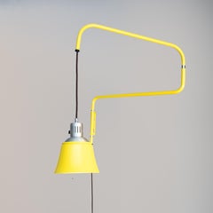 Extendable wall lamp Heinrich-Siegfried Bormann 1970 yellow version space age