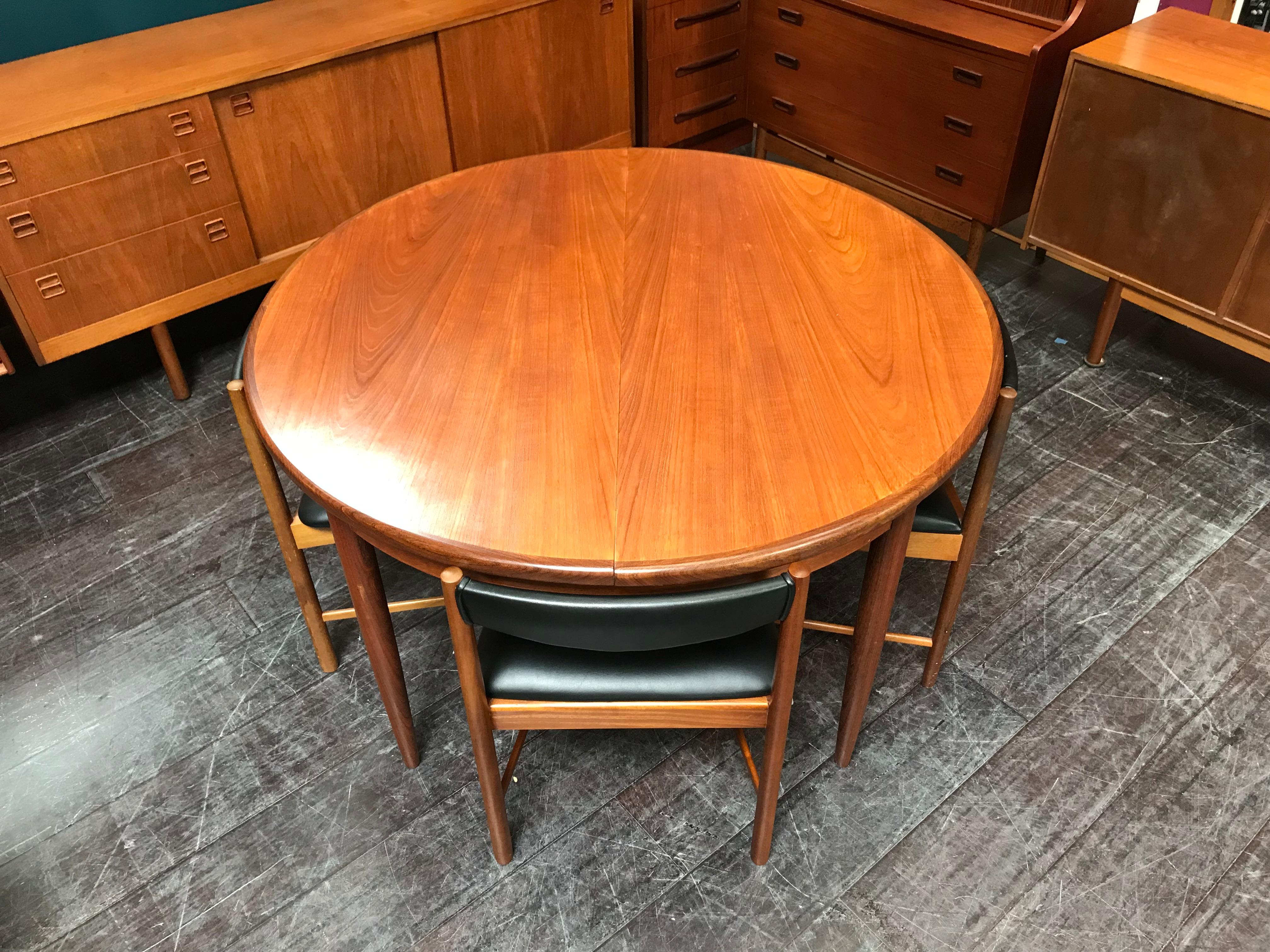 This table and chairs show a distinct Danish influence, typical of the period. This Classic midcentury G Plan dining table comes with 4 chairs and extends to accommodate 6 people if required. The 4 chairs were made by McIntosh of Kirkcaldy and come