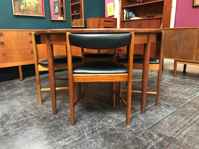 Extending Midcentury G Plan Teak Dining Table with 4 Chairs in Black Vinyl For Sale at 1stDibs