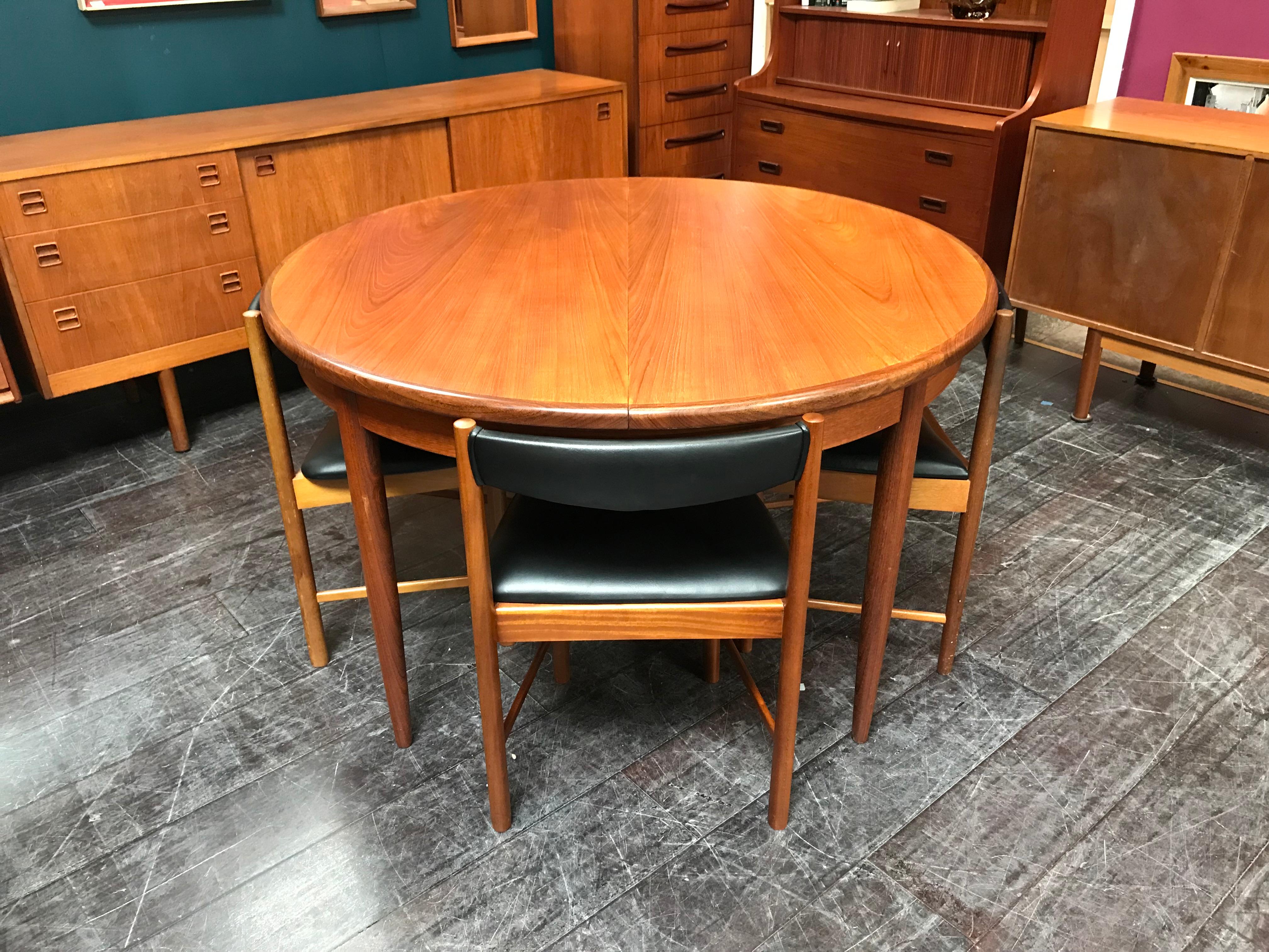 English Extending Midcentury G Plan Teak Dining Table with 4 Chairs in Black Vinyl For Sale