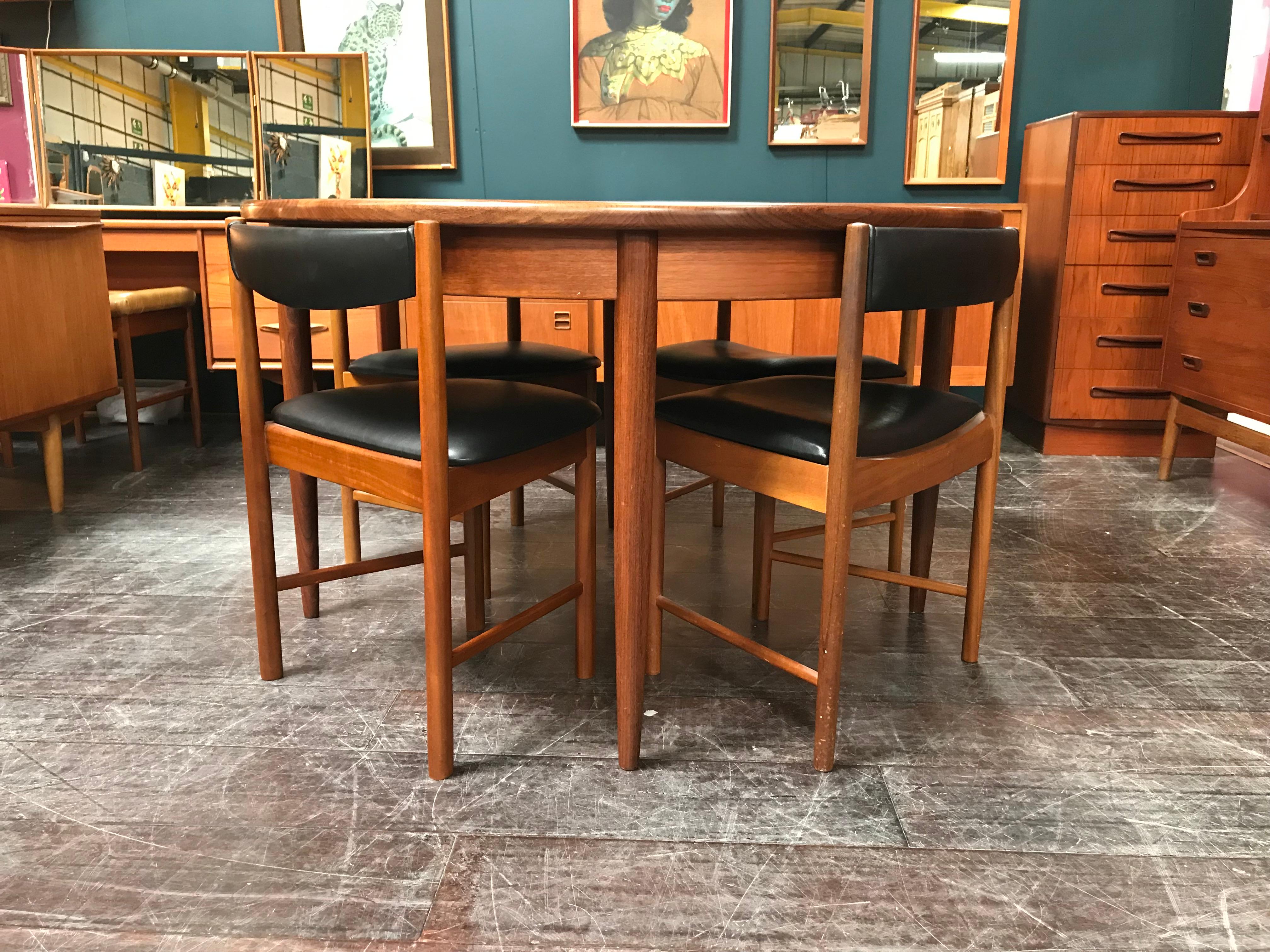 20th Century Extending Midcentury G Plan Teak Dining Table with 4 Chairs in Black Vinyl For Sale