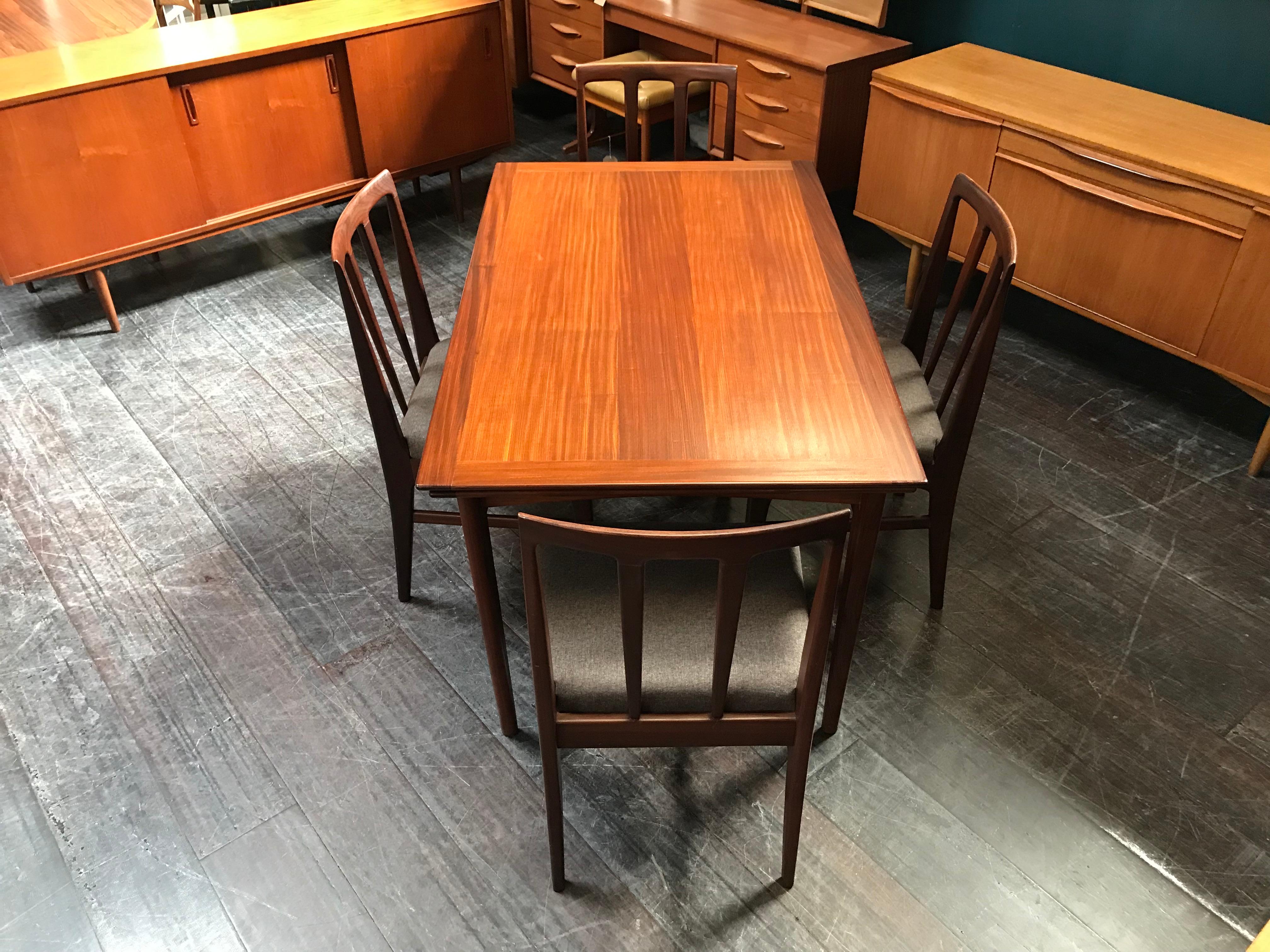 20th Century Extending Midcentury Afrormosia Dining Table with 4 Chairs by Younger of Glasgow For Sale