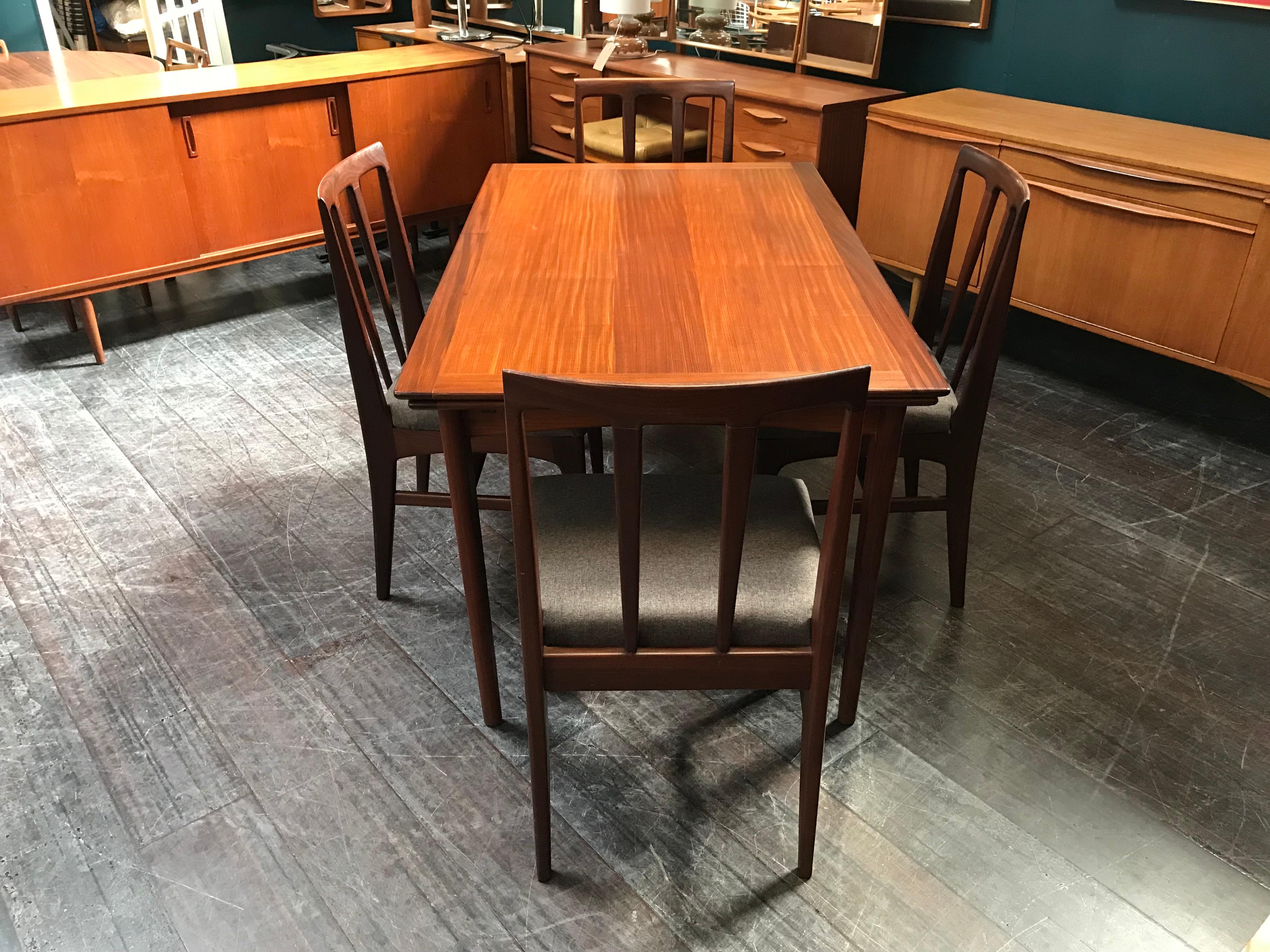 Teak Extending Midcentury Afrormosia Dining Table with 4 Chairs by Younger of Glasgow For Sale