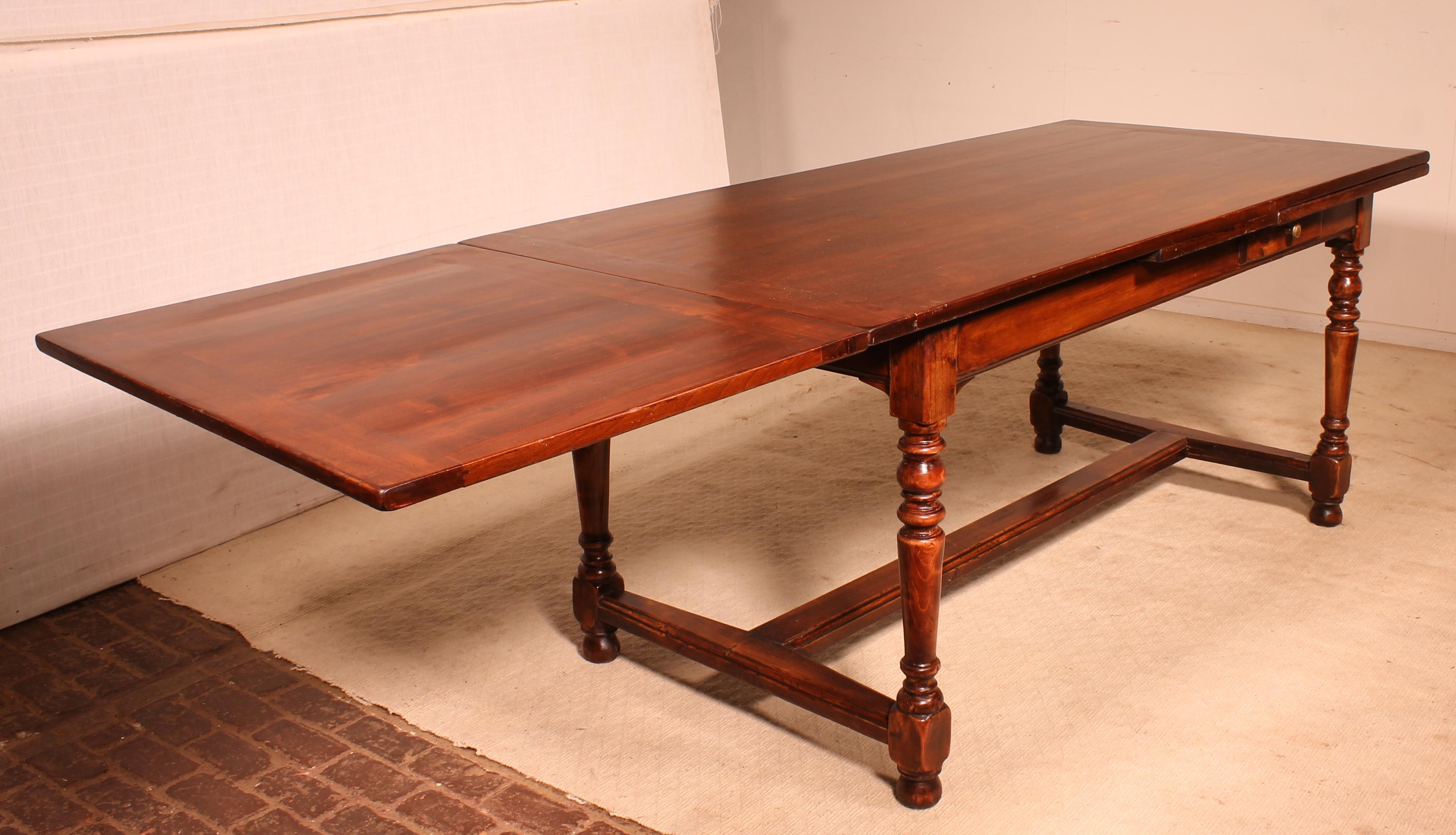 A fine 19th century extending table in cherry wood with turned legs in Louis XIII style 

Very nice French table with a length of 1m 74 and the possibility to reach 3m 08 with the two extensions open

 Very nice dining table with elegant turned