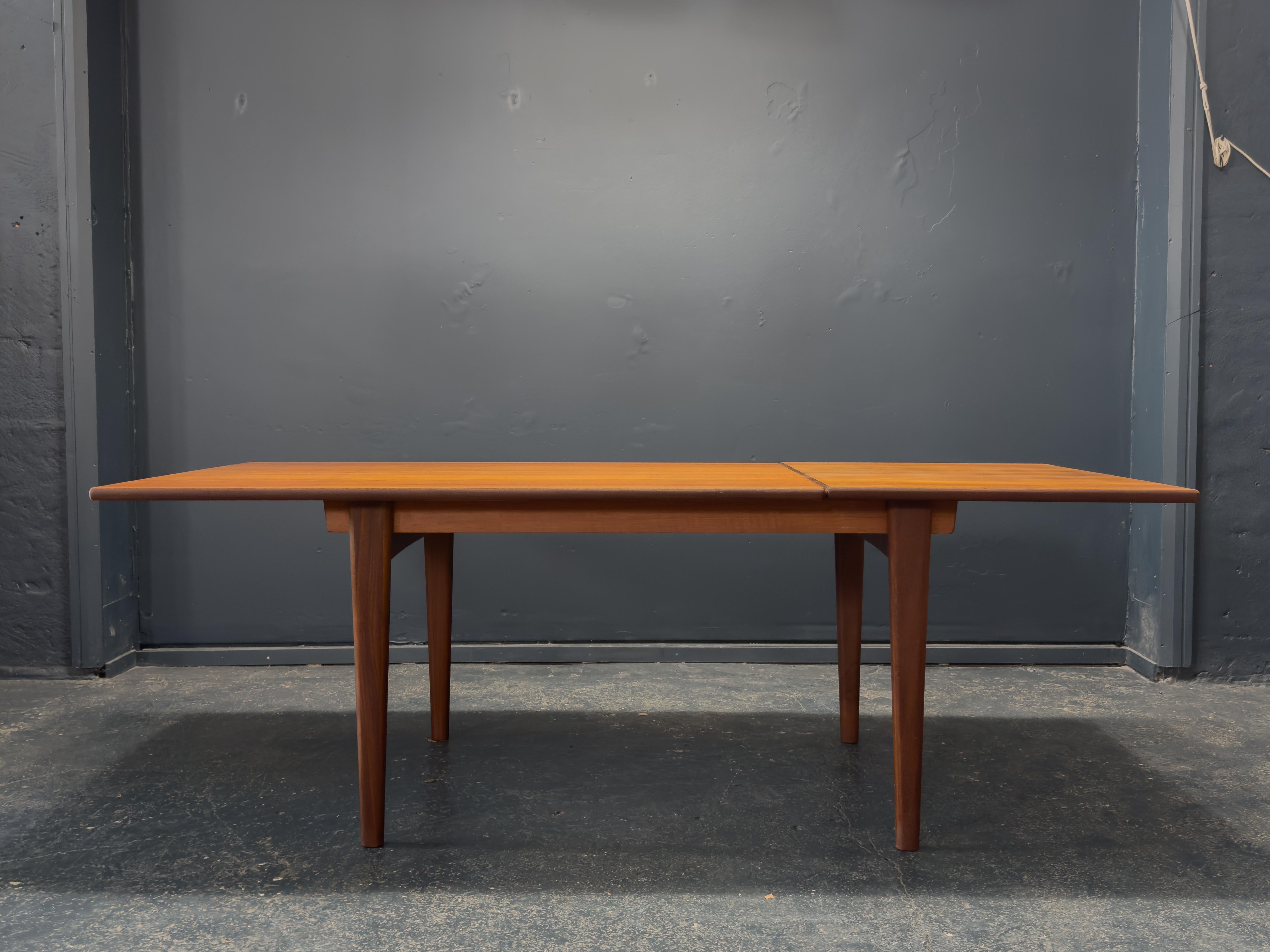 Mid-Century Modern Extending Teak Rectangular Dining Table For Sale