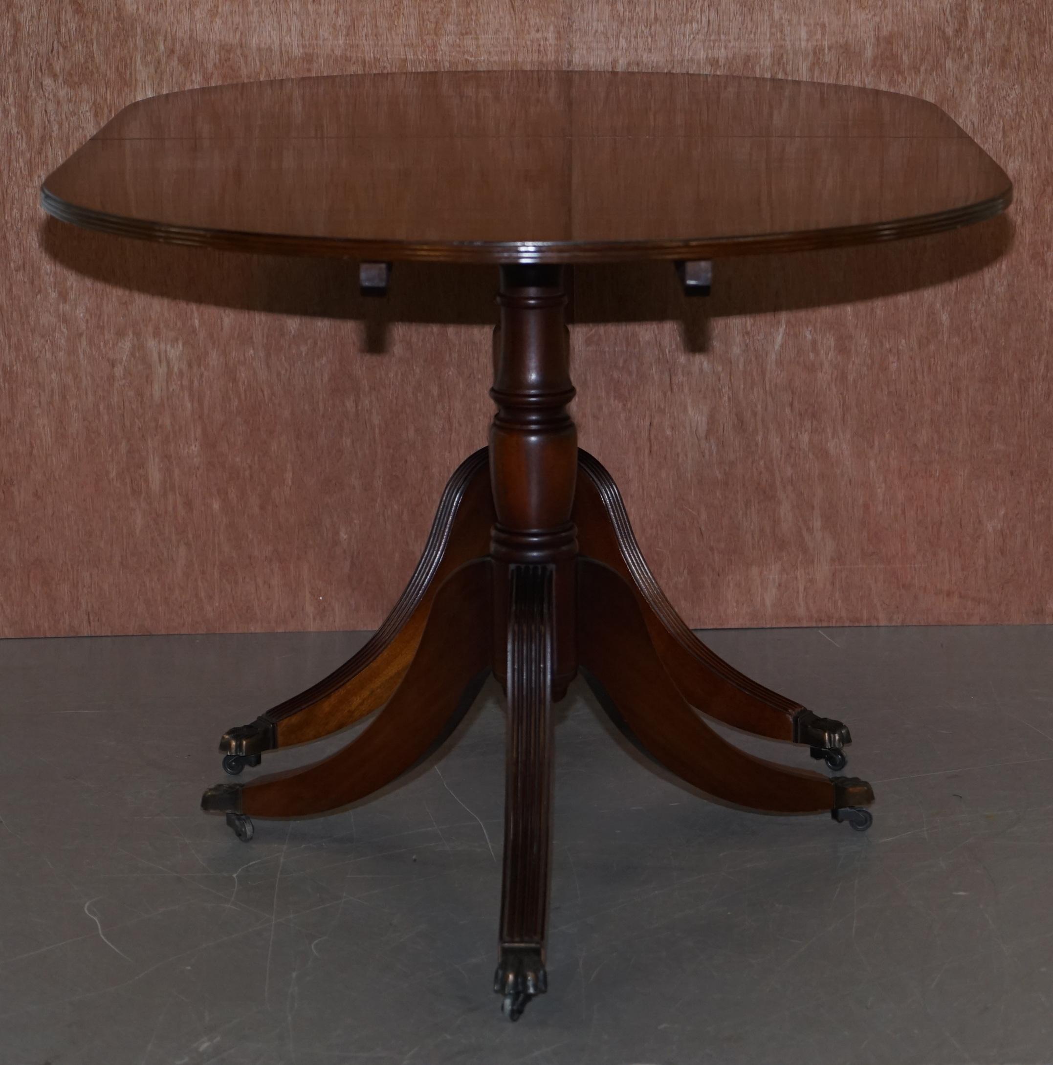 Extending Tilt Top Oval Dining Table in the Regency Style Solid Hardwood Castors 7