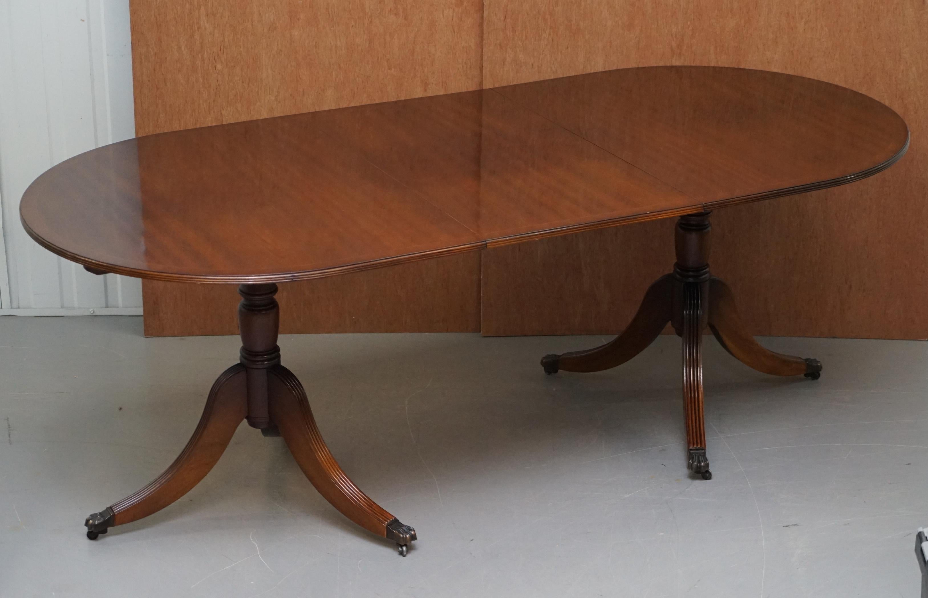 Extending Tilt Top Oval Dining Table in the Regency Style Solid Hardwood Castors 9
