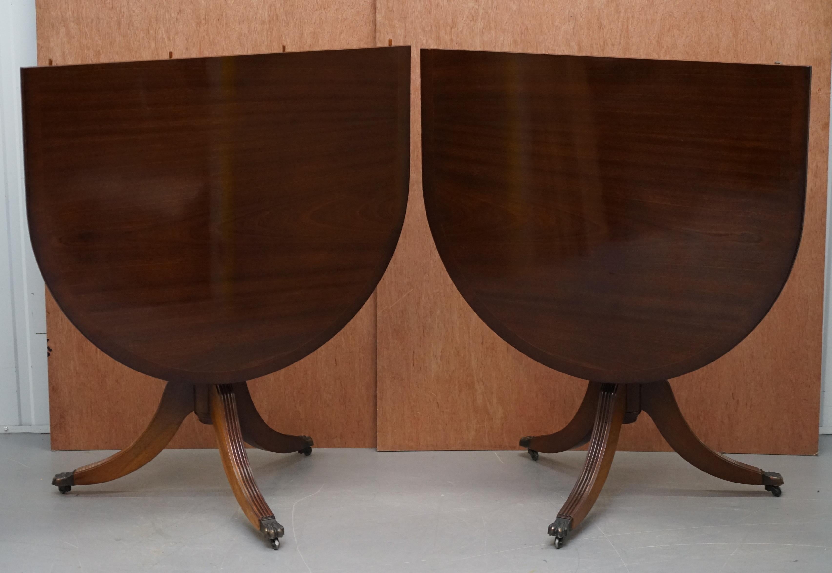 English Extending Tilt Top Oval Dining Table in the Regency Style Solid Hardwood Castors