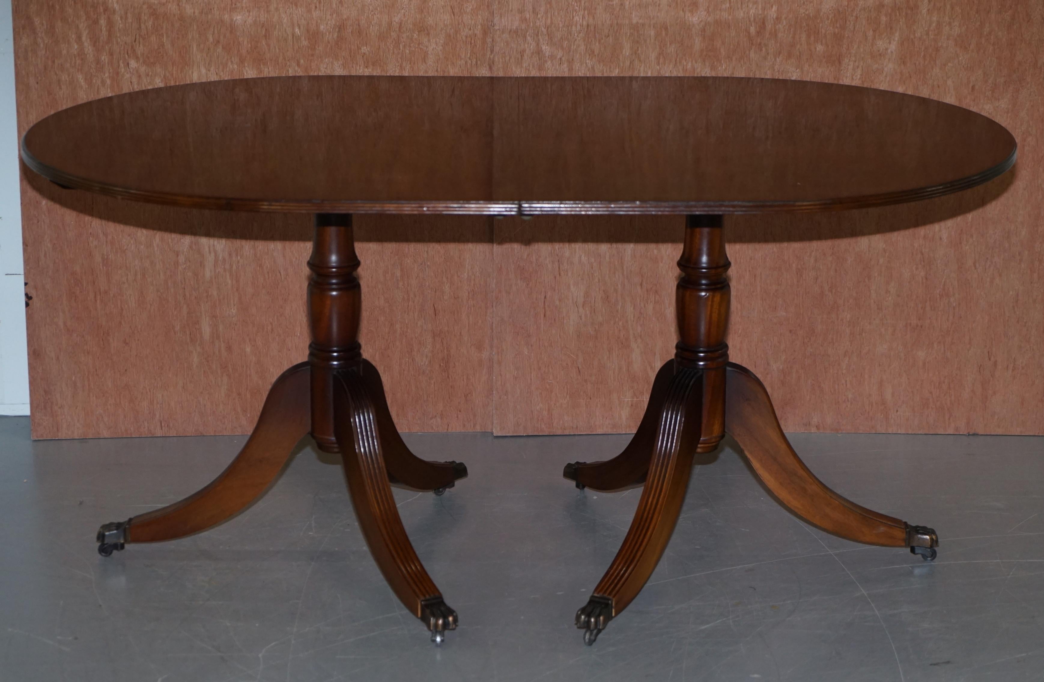 20th Century Extending Tilt Top Oval Dining Table in the Regency Style Solid Hardwood Castors
