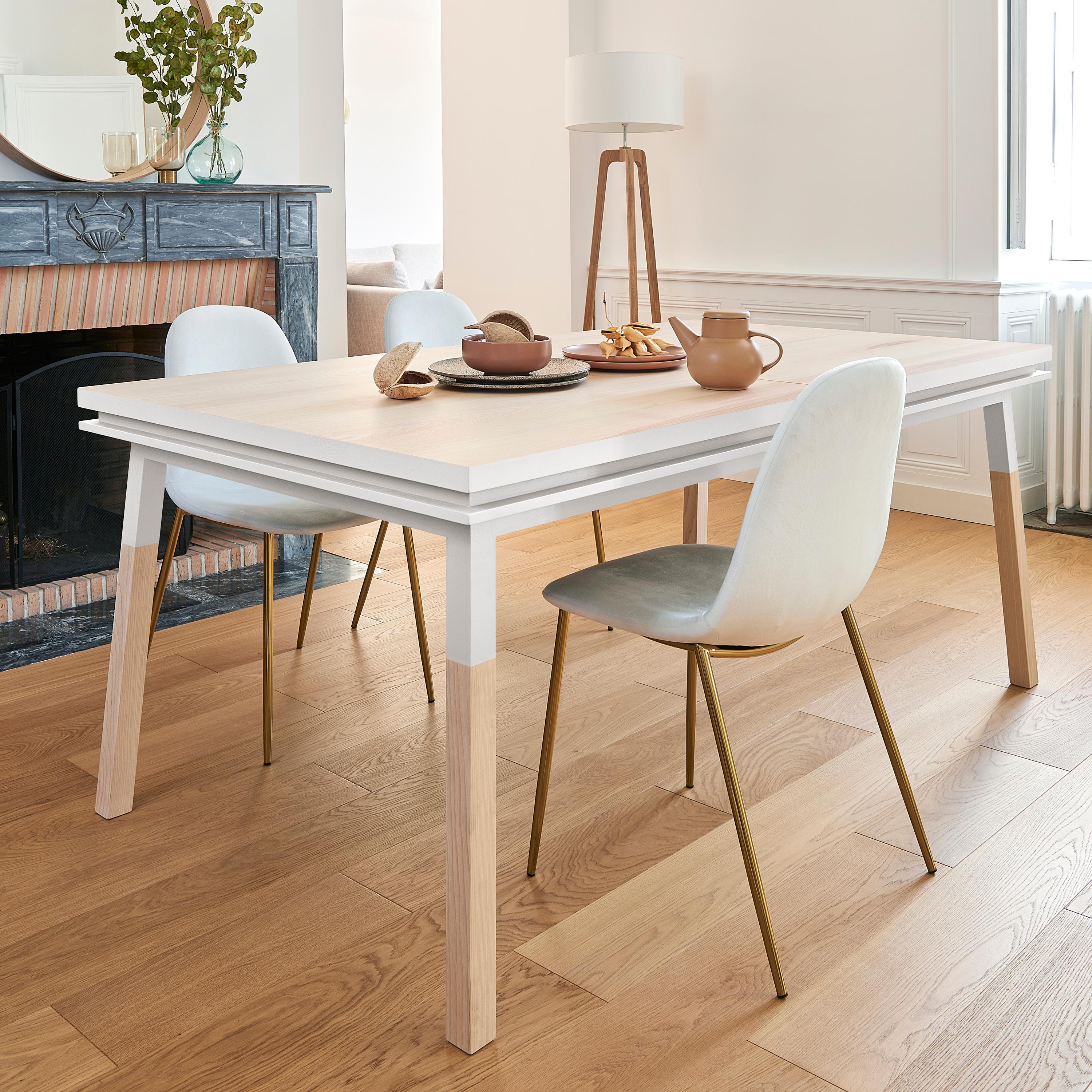 This extensible dining table is designed by Eric Gizard in Paris. 

It is made of 100% solid ash wood from sustainably managed and PEFC certified French forests.
Length: closed 200 cm / 78.7