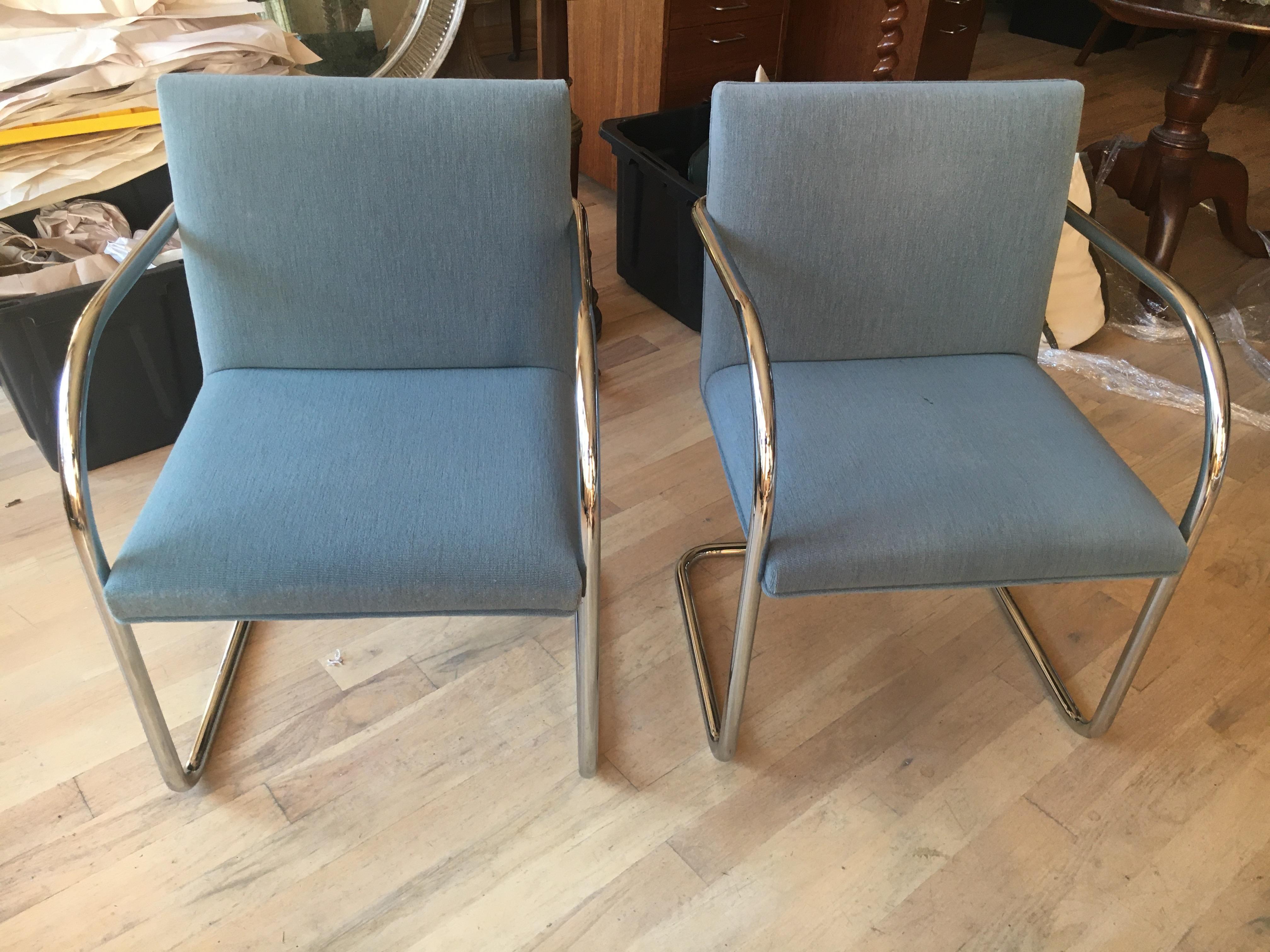 Extensive collection of 48 Mies Brno style tubular armchairs. Great for contract application. Very good condition, covered in a steel blue Grosse pointe upholstery that wears like steel. Very comfortable and sturdy.