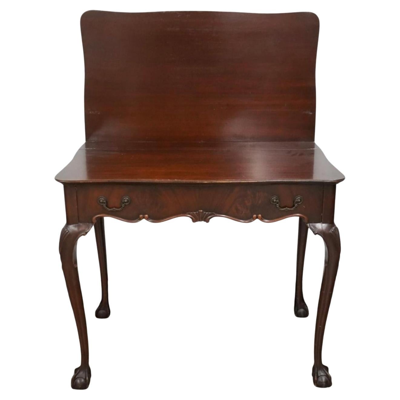 Mod 2oth Century Extensole Furniture Chippendale Style Mahogany Fold Top card or console with ball claw feet.
Measure 35