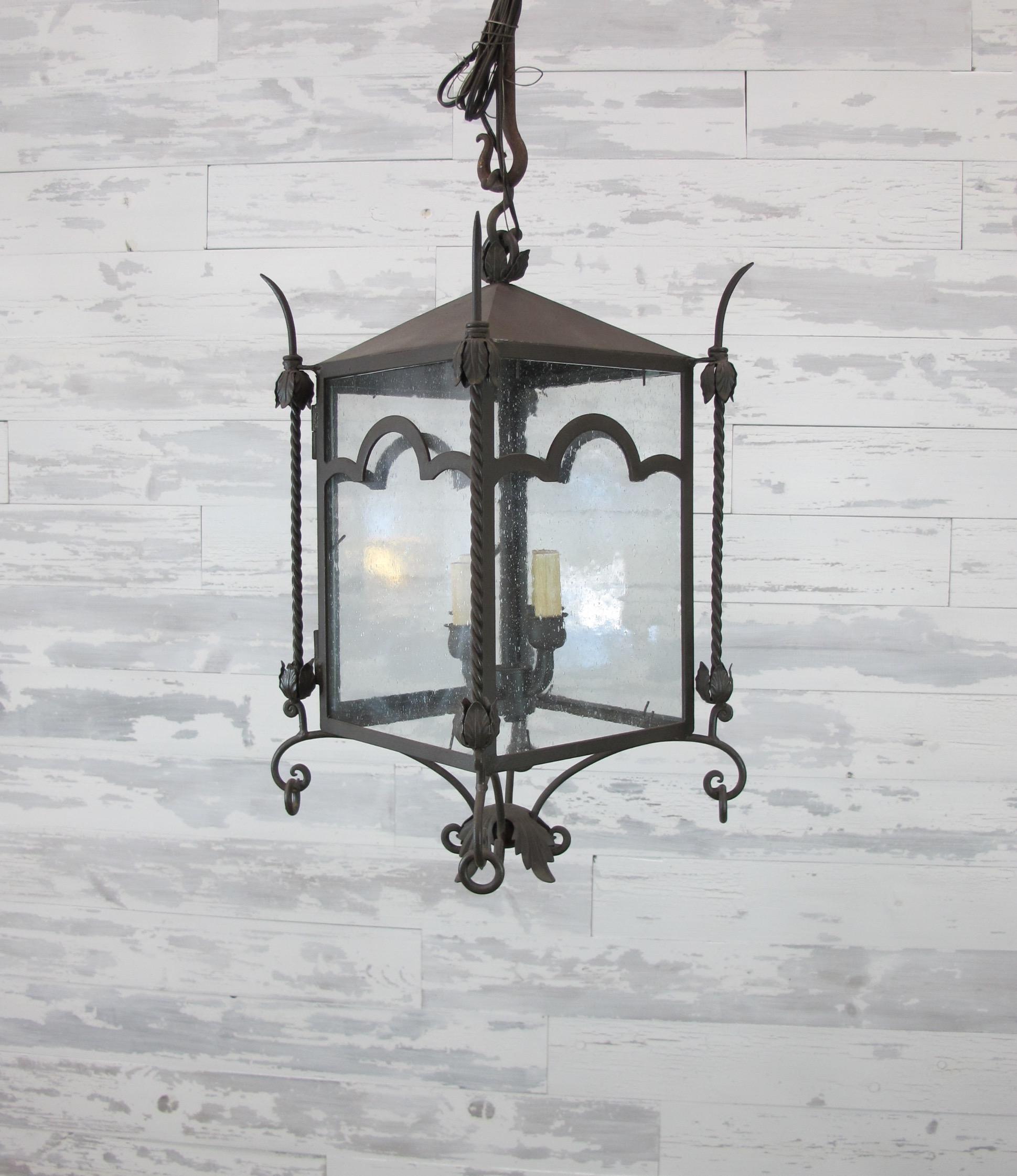Part of the Chandelier product line, the Lori lantern, large is a beautiful interior or exterior lantern that can be hung on its own or on a decorative bracket for a wall light. 

One on stock or made to order. If more than one is ordered lead time