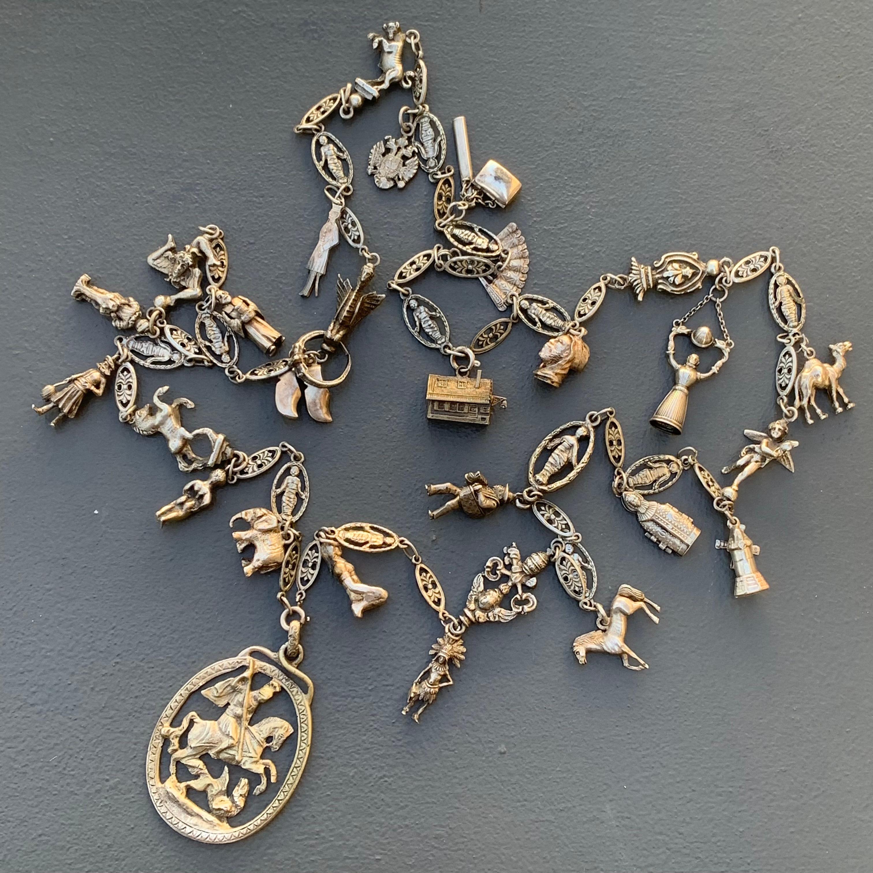 Absolutely stunning RARE Peruzzi 800 Silver St George Pendant charm Necklace .Necklace is extremely well made with very fine details . Chain is very long with different links ( mummies , 3d horse ,3d swan , cherub to name a few ) with 3D