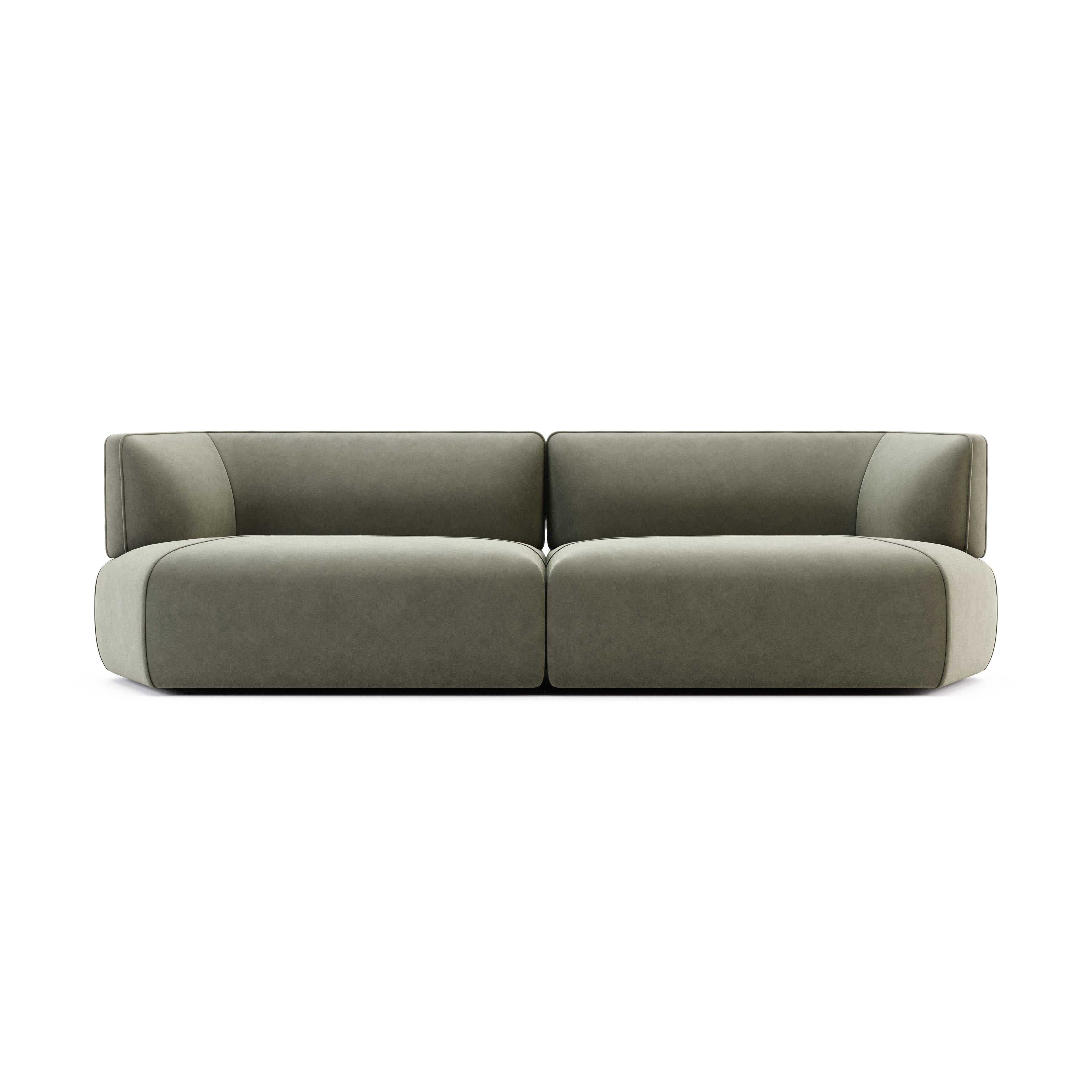 Canapé sectionnel sur mesure et entièrement rembourré, proposé dans une sélection de tissus luxueux et veloutés.
Représenté avec du velours de coton taupe. Cadre en bois dur avec suspension à ressorts de confort avancée. Les coussins d'assise et de