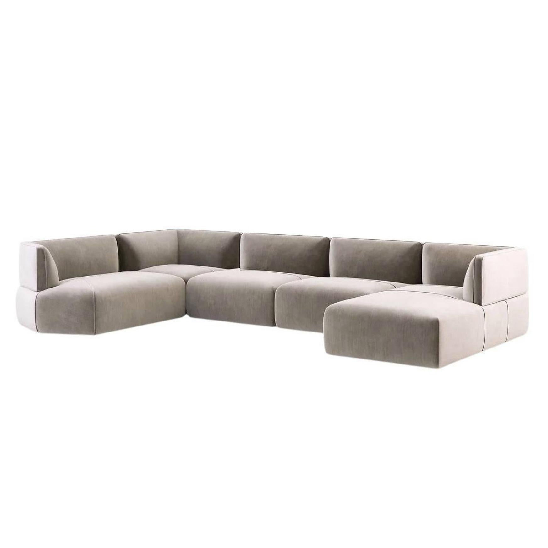 Tailor made and fully upholstered sectional sofa offered in a selection of luxurious, velvet fabrics.
Shown with taupe cotton velvet. All hardwood frame with advanced comfort spring suspension. The seat and back cushions filled with premium