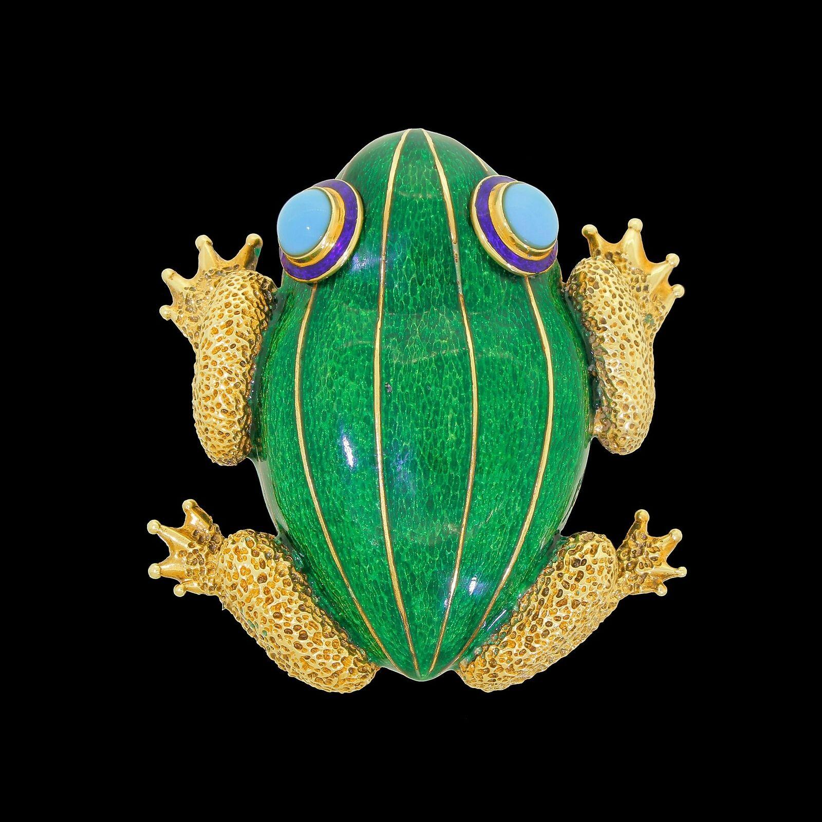 Details & Condition: Exquisite 14 Karat yellow gold tree frog with vibrant green enamel and perfectly matched sky blue Persian Turquoise cabochon eyes.
A 3d life like appearance is evident throughout the attention to detailing is second to none.
His