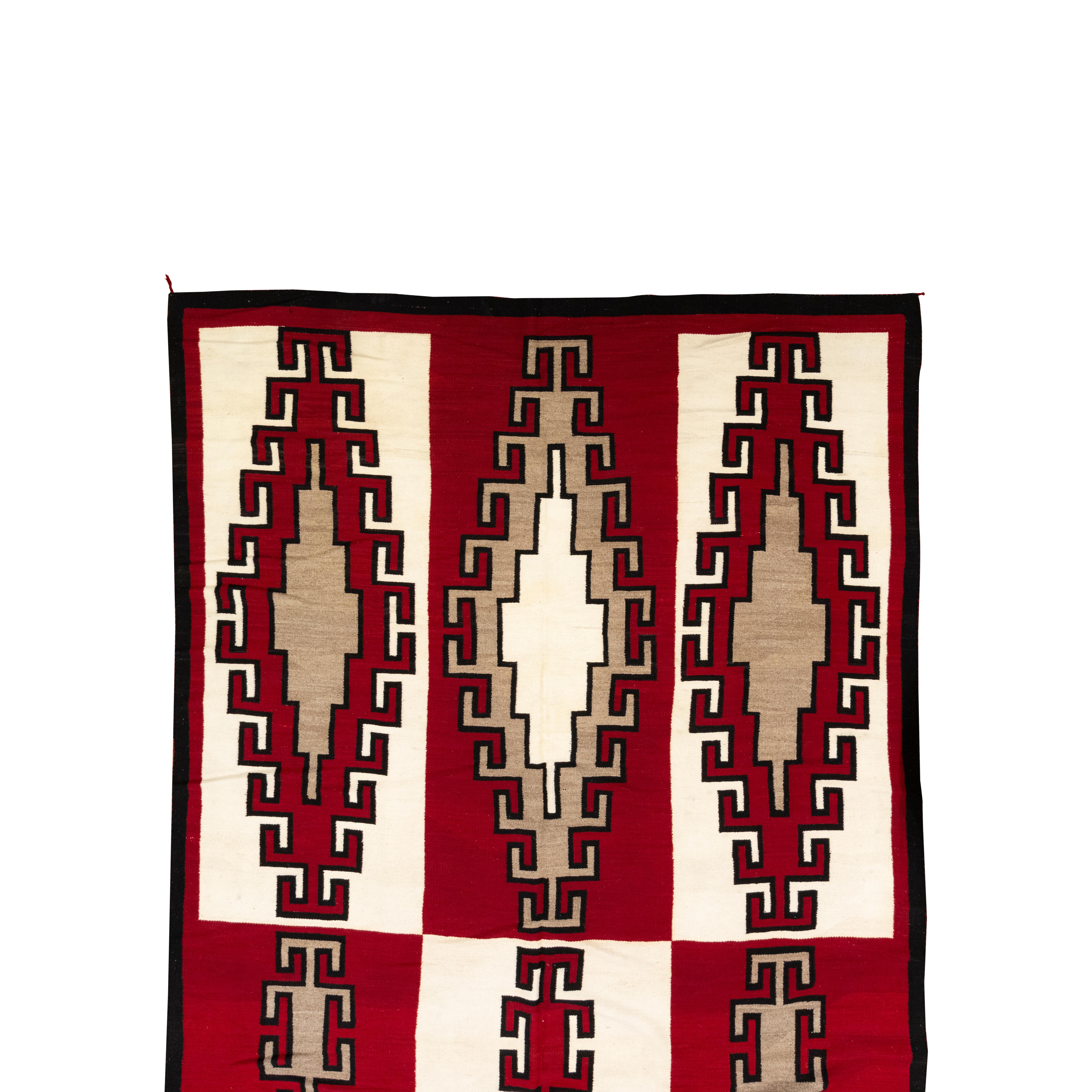 Navajo nine panel Ganado area weaving. 7’11” x 14’. Beautiful and bright reds, creams and browns with geometric patterns. Very little if any wear. 

Origin: Navajo, Southwest
Period: Circa 1920 - 30s
Dimensions: 7’11” x 14’

Family Owned &