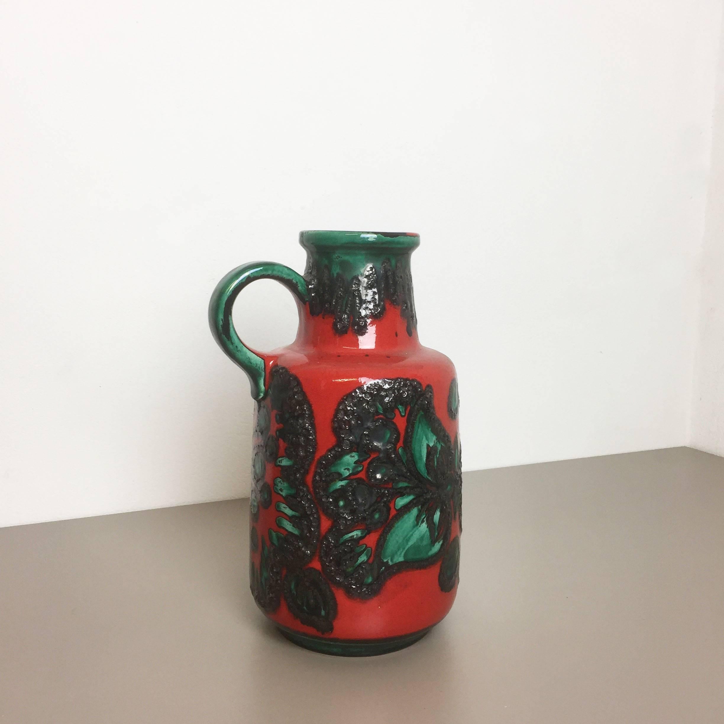 Article:

Fat Lava Art Vase


Producer:

Scheurich, Germany


Design:

Nr. 408-40



Decade:

1970s.




This original vintage vase was produced in the 1970s in Germany. It is made of porcelain in Fat Lava Optic. Super rare in