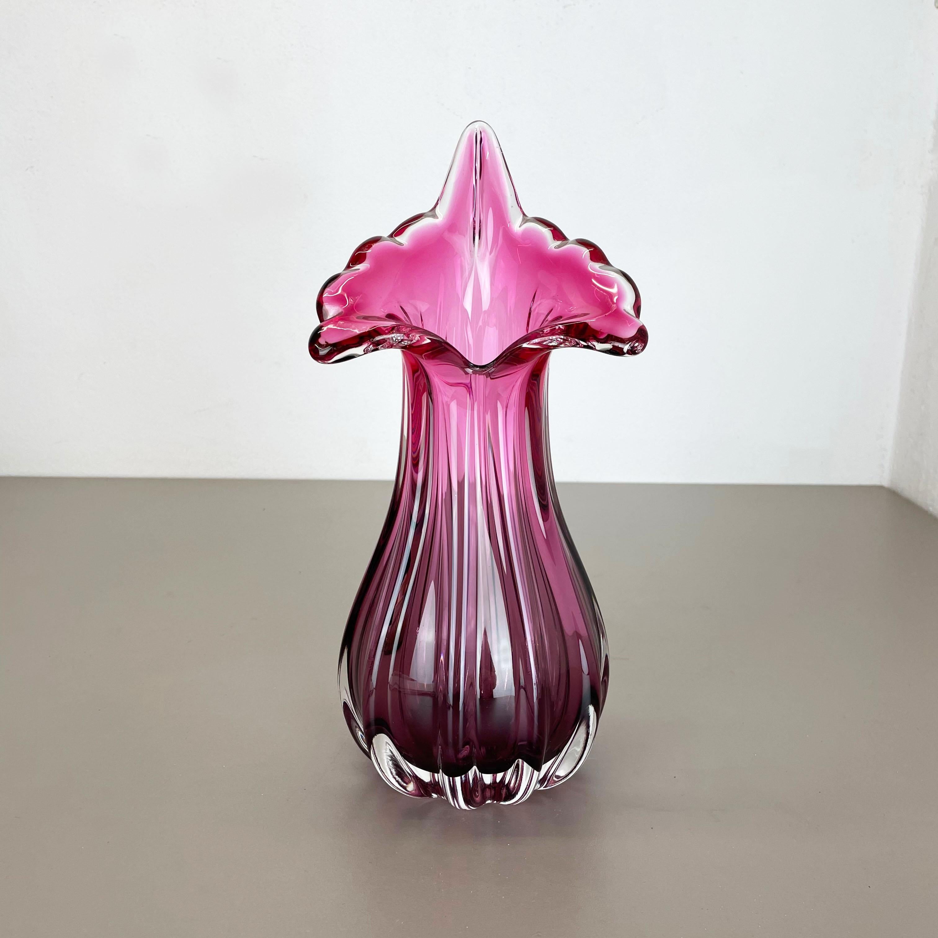Article:

Murano glass vase


Origin:

Murano, Italy


Decade:

1970s



This original vintage glass vases was designed and produced in the 1970s in Murano, Italy. It is made in murano glass technique and has a fantastic organic