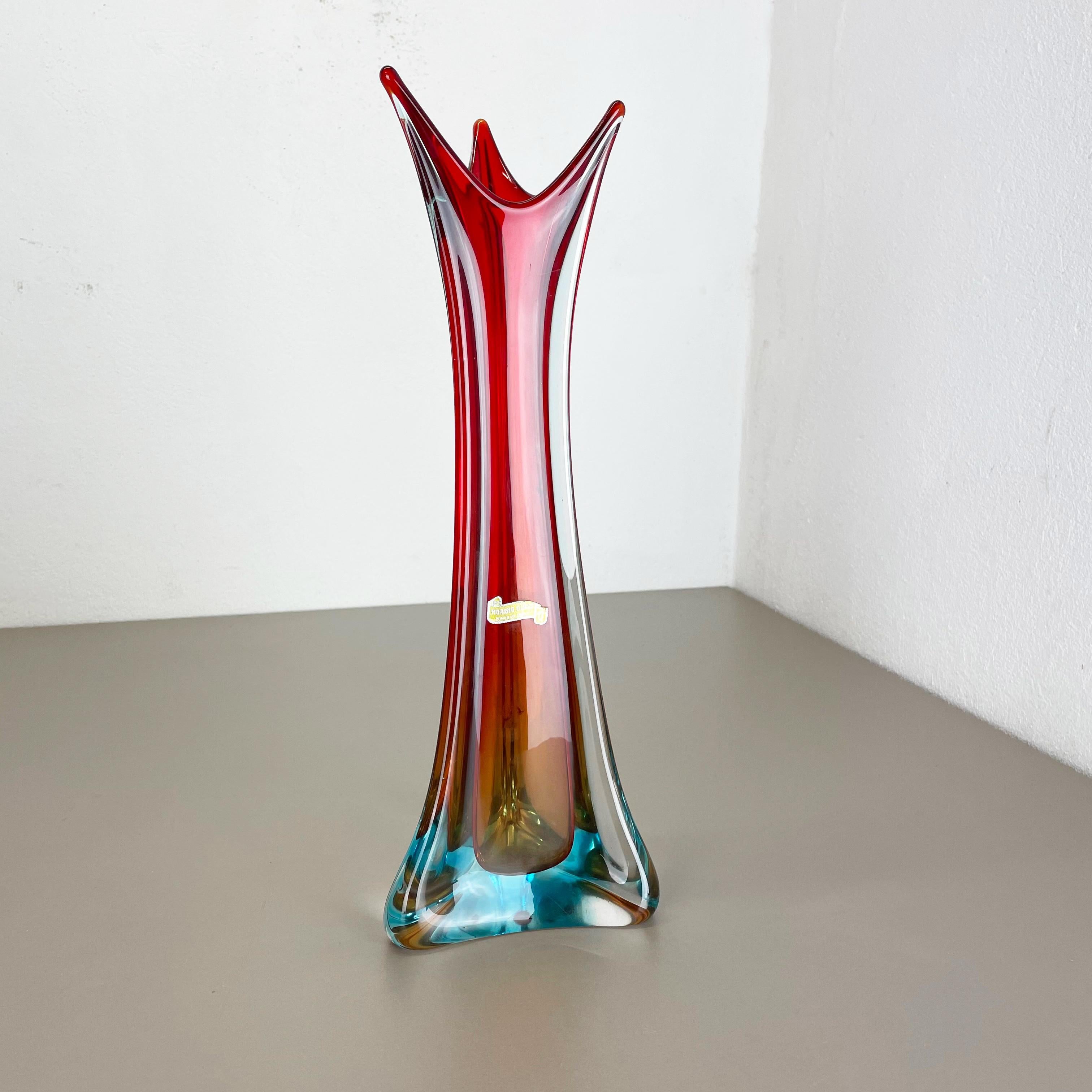 Article:

Murano glass vase


Origin:

Murano, Italy


Decade:

1970s



This original vintage glass vases was designed and produced in the 1970s in Murano, Italy. It is made in Sommerso technique and has a fantastic organic shaped