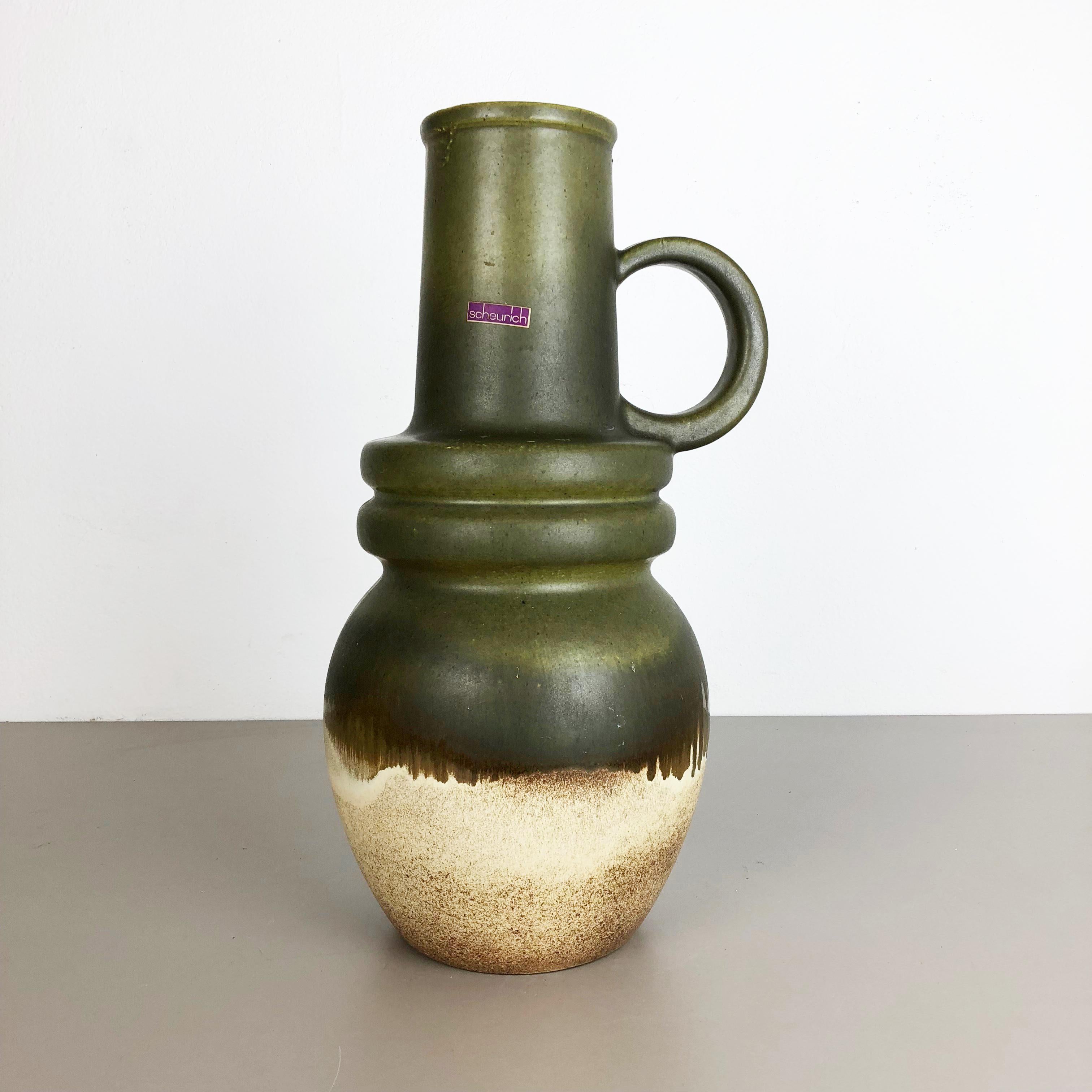 Article:

Extra large fat lava art vase. 

Measures: 48 cm



Model: 

428 48 Vienna



Producer:

Scheurich, Germany



Decade:

1970s


 

This original vintage vase was produced in the 1970s in Germany. It is made of
