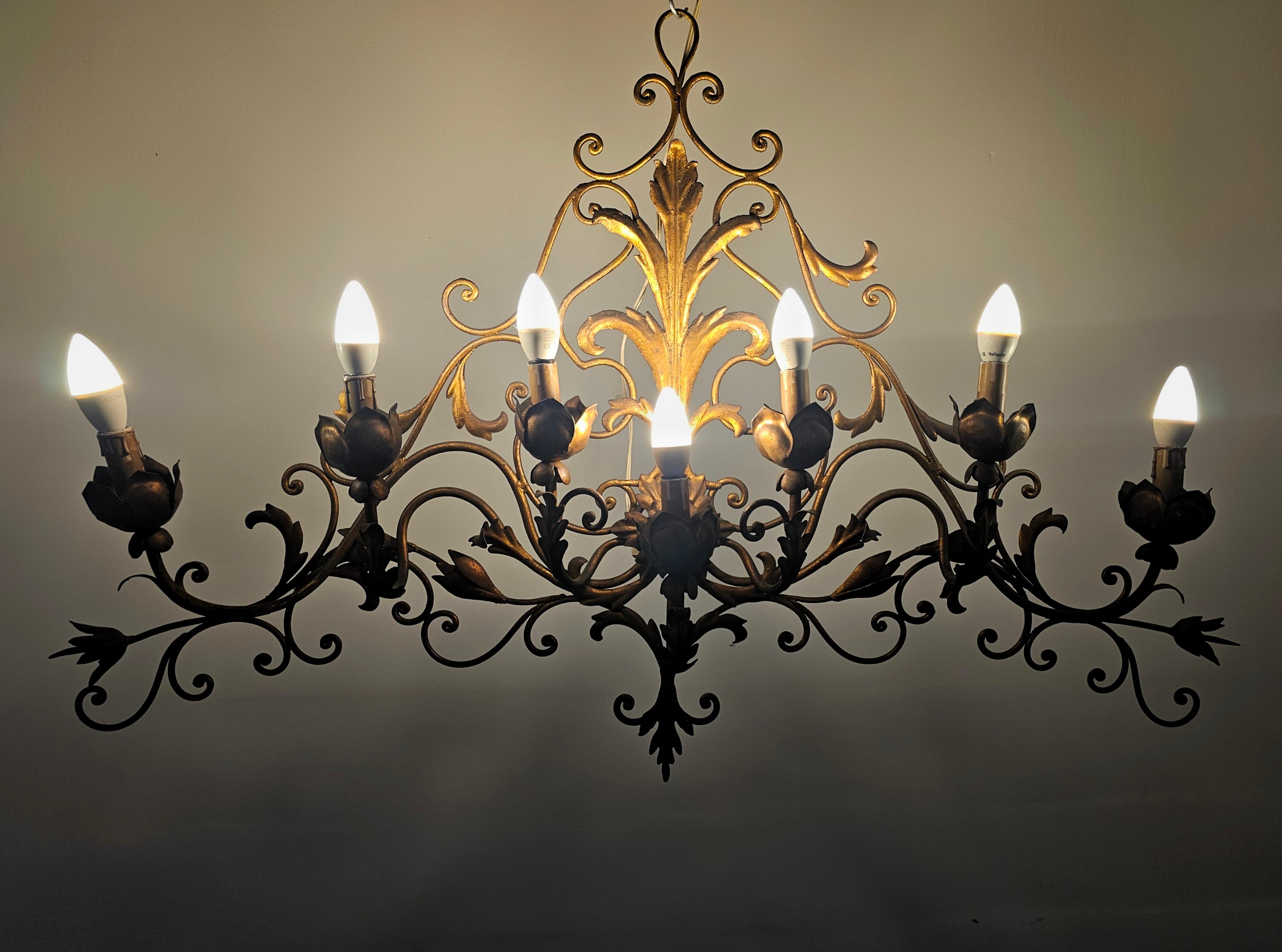 Neoclassical Extra Large 7-Arm Sconce done in gilt metal, featuring acanthus leaf by Palladio For Sale