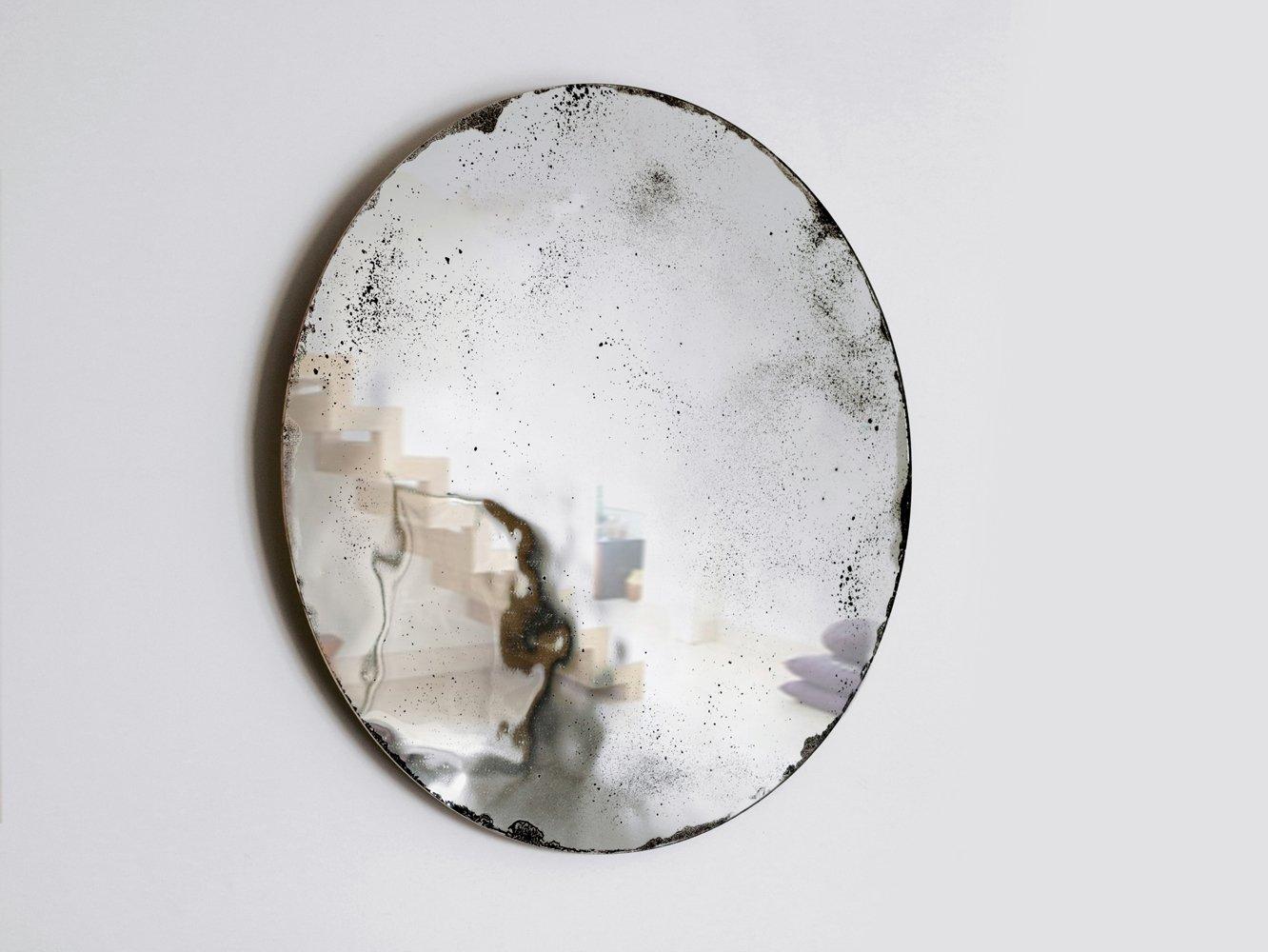 Extra large alice mirror by Slow Design 
Dimensions: Diameter 120 cm 
Materials: Glass. gold/ grey/ blue/ moss green /MD on back side oxidation effect on the clear mirror.
Technique: Grisaille.
Available in gold/moss green/blue/black. Also