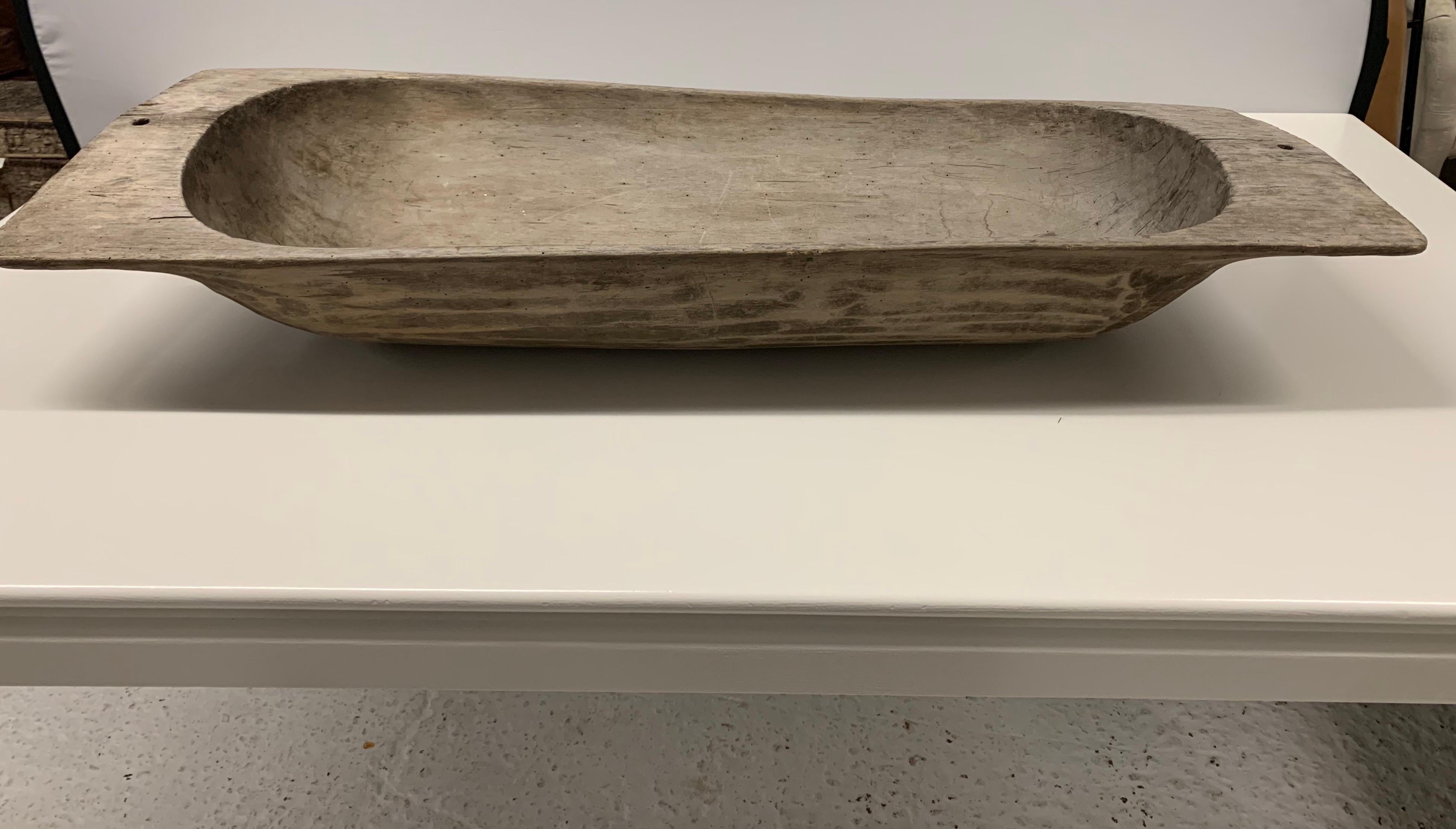 Stunning extra large wooden dough bowl. Great lines and better scale. What truly sets
this bowl apart is it's size, measuring just under four feet wide! It also has a gorgeous patina.
Now, more than ever, home is where the heart is.
