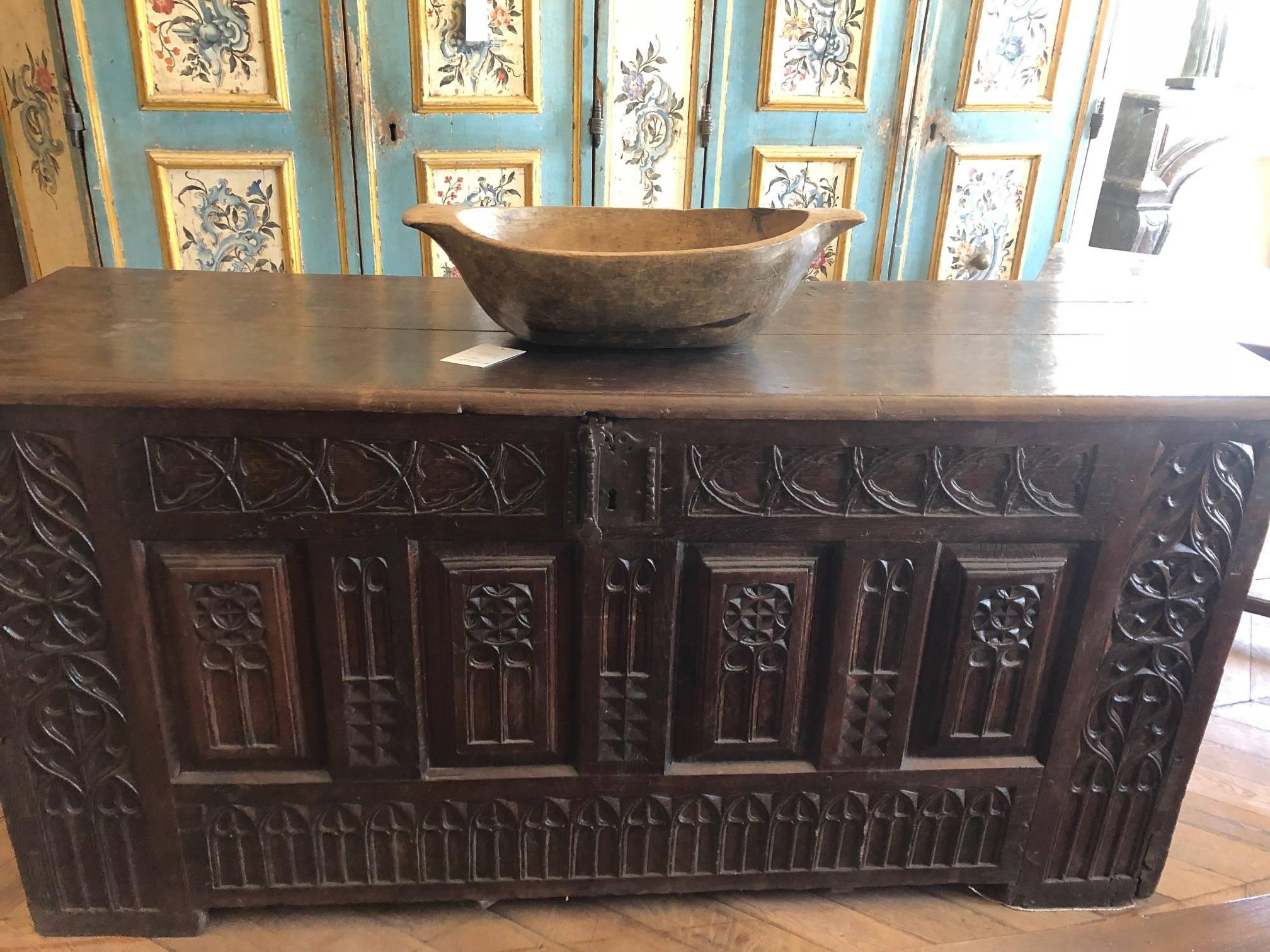 This well built, antique, Spanish, oak trunk is carved with intricate details and will definitely add character to the room! 

Origin: Spain

circa 1800.