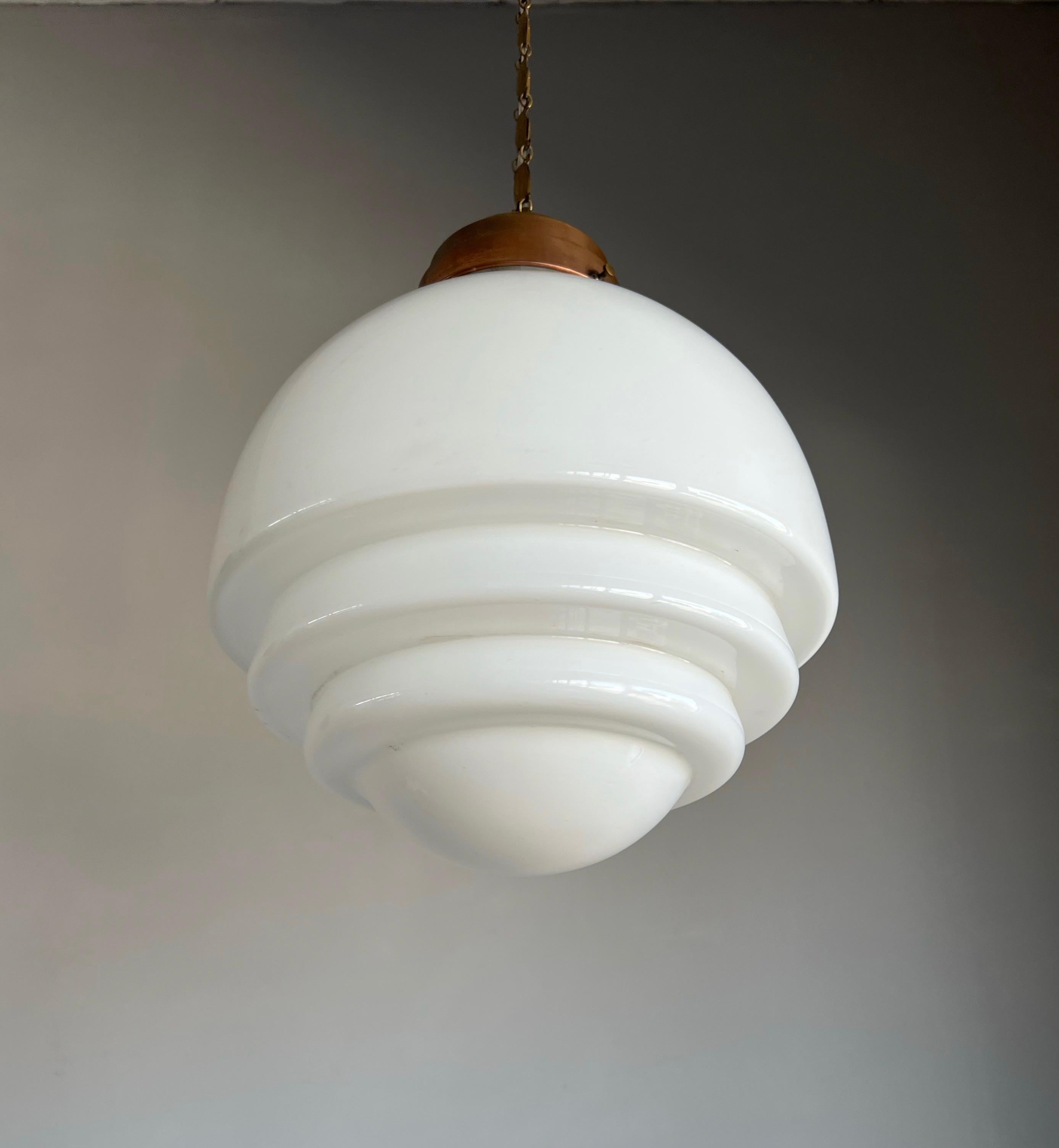 Large size and great shape Bauhaus pendant light.

If you are looking for a beautiful and truly stylish pendant for a midcentury, for an Art Deco or for a contemporary, Industrial Style interior then this could be your perfect lighting solution.