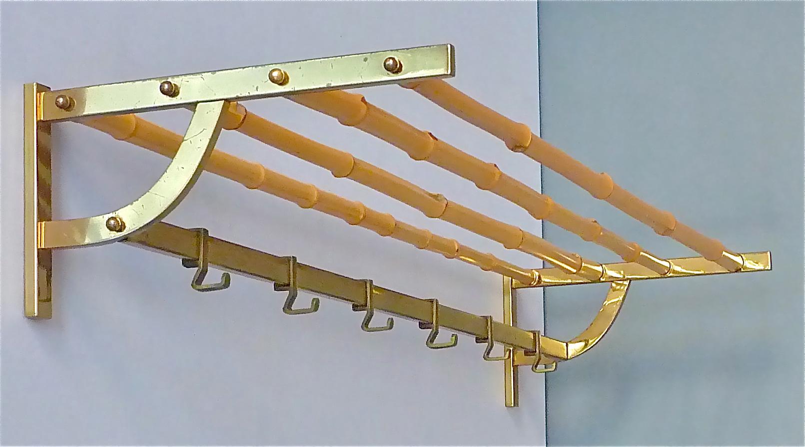 Extra large stunning and exceptional modernist coat rack or wall wardrobe, which has been designed and executed in the 1950s in Austria, probably it belongs to one of the wonderful designs by Auböck, Hagenauer, Josef Frank for Haus & Garten or
