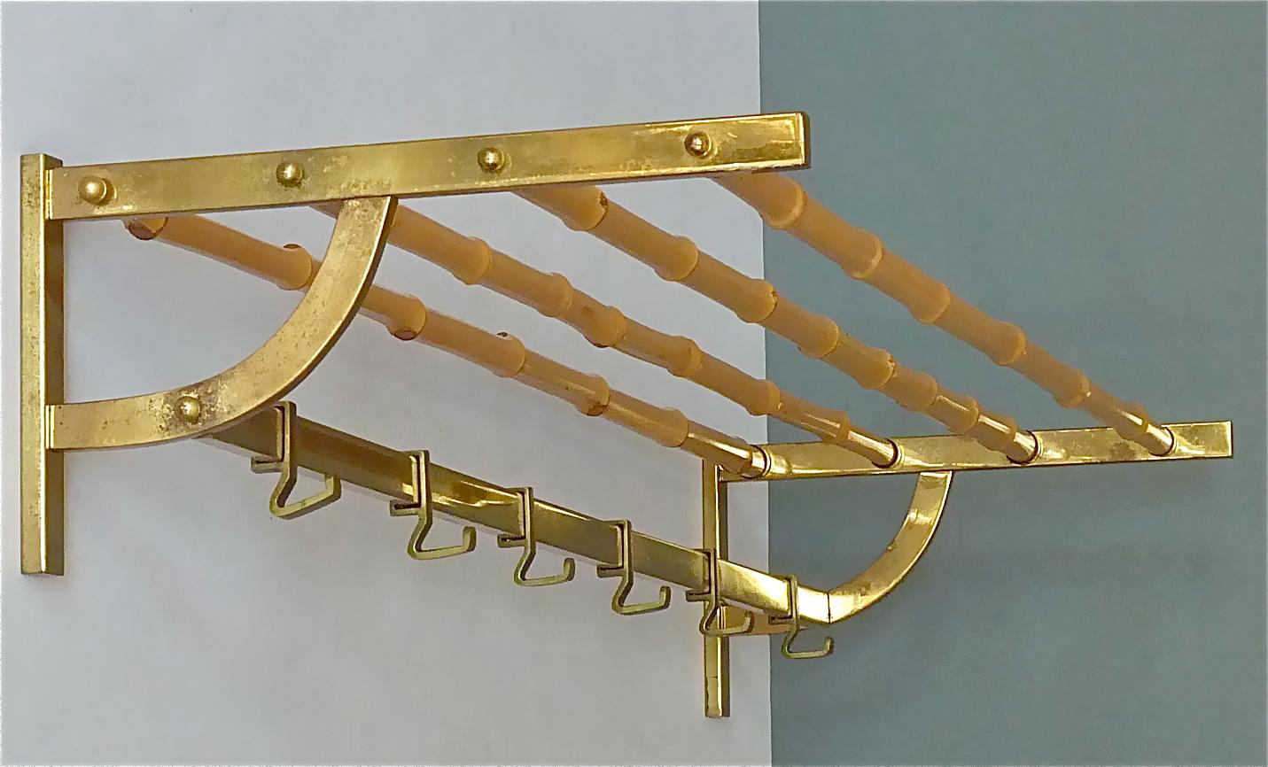 Extra large stunning and exceptional modernist coat rack or wall wardrobe, which has been designed and executed in the 1950s in Austria, probably it belongs to one of the wonderful designs by Auböck, Hagenauer, Josef Frank for Haus & Garten or