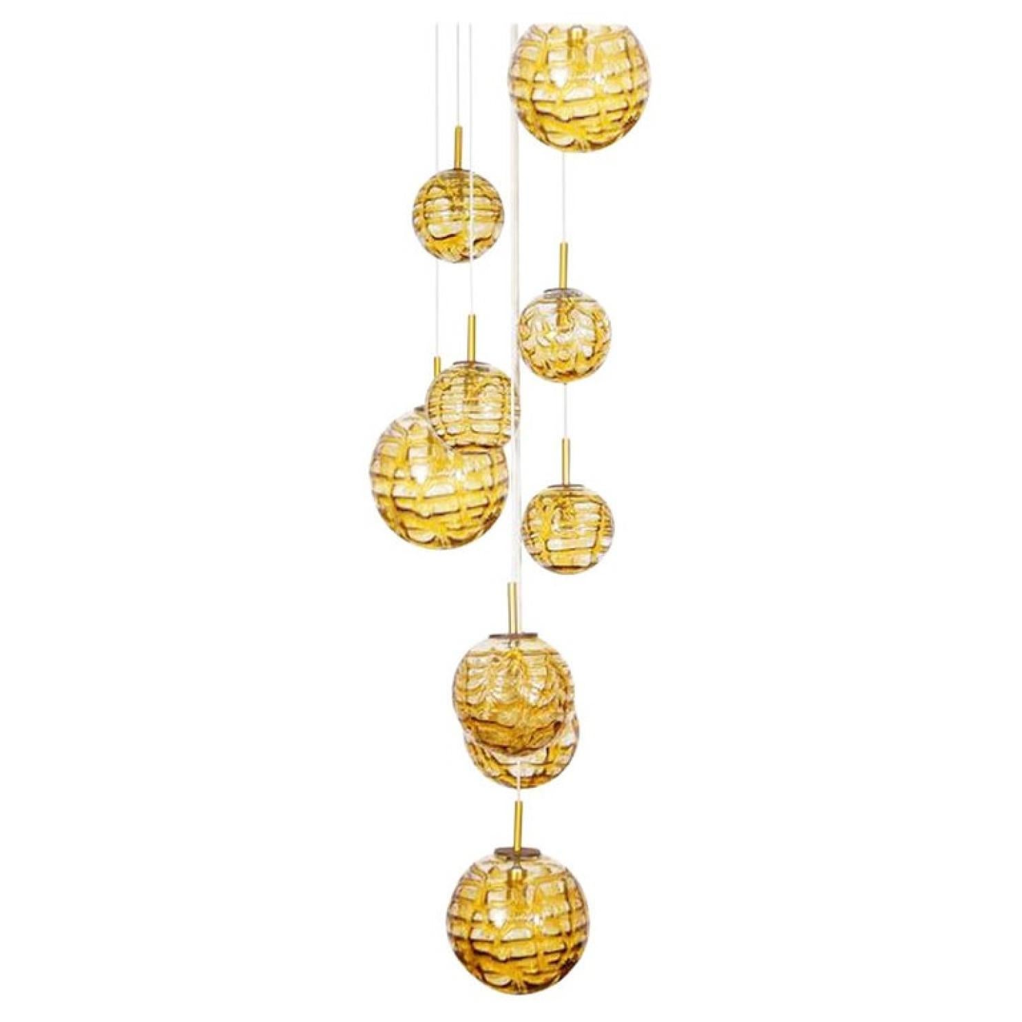 Stunning nine amber Murano glass globes chandelier flush mount. Outstanding high- end quality hand blown design with an amazing color.
A statement piece in the any room. Wonderful light effect due to lovely glass elements.

We can deliver with a