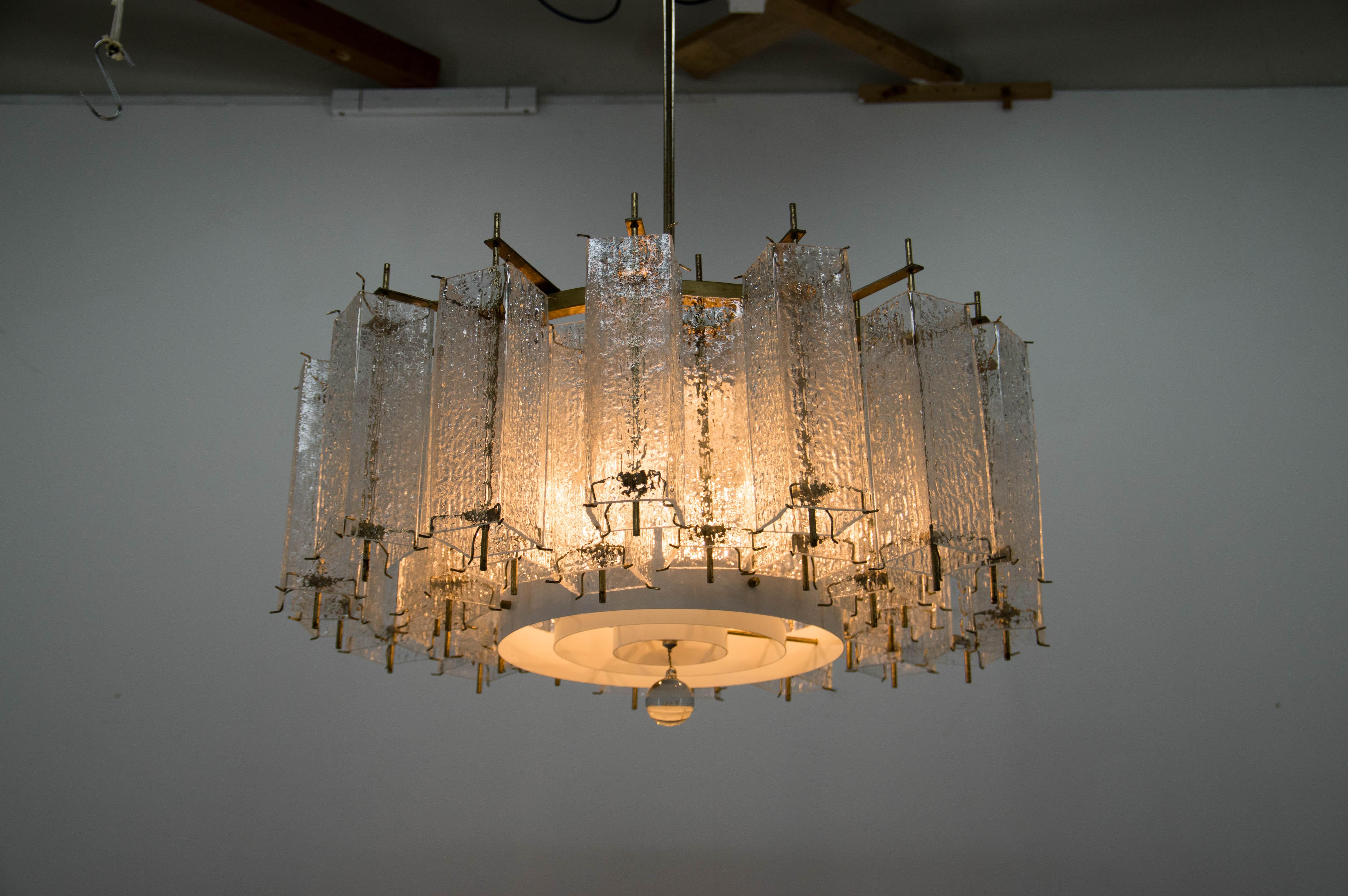 Large Brutalist chandelier by Kamenicky Senov.
Two pieces available. (One items is without bottom glass small globe)
Cleaned, rewired: two separate circuits - 3+3 x 60 W, E25-E27 bulbs
Glass in perfect condition
Brass with age patina
US wiring