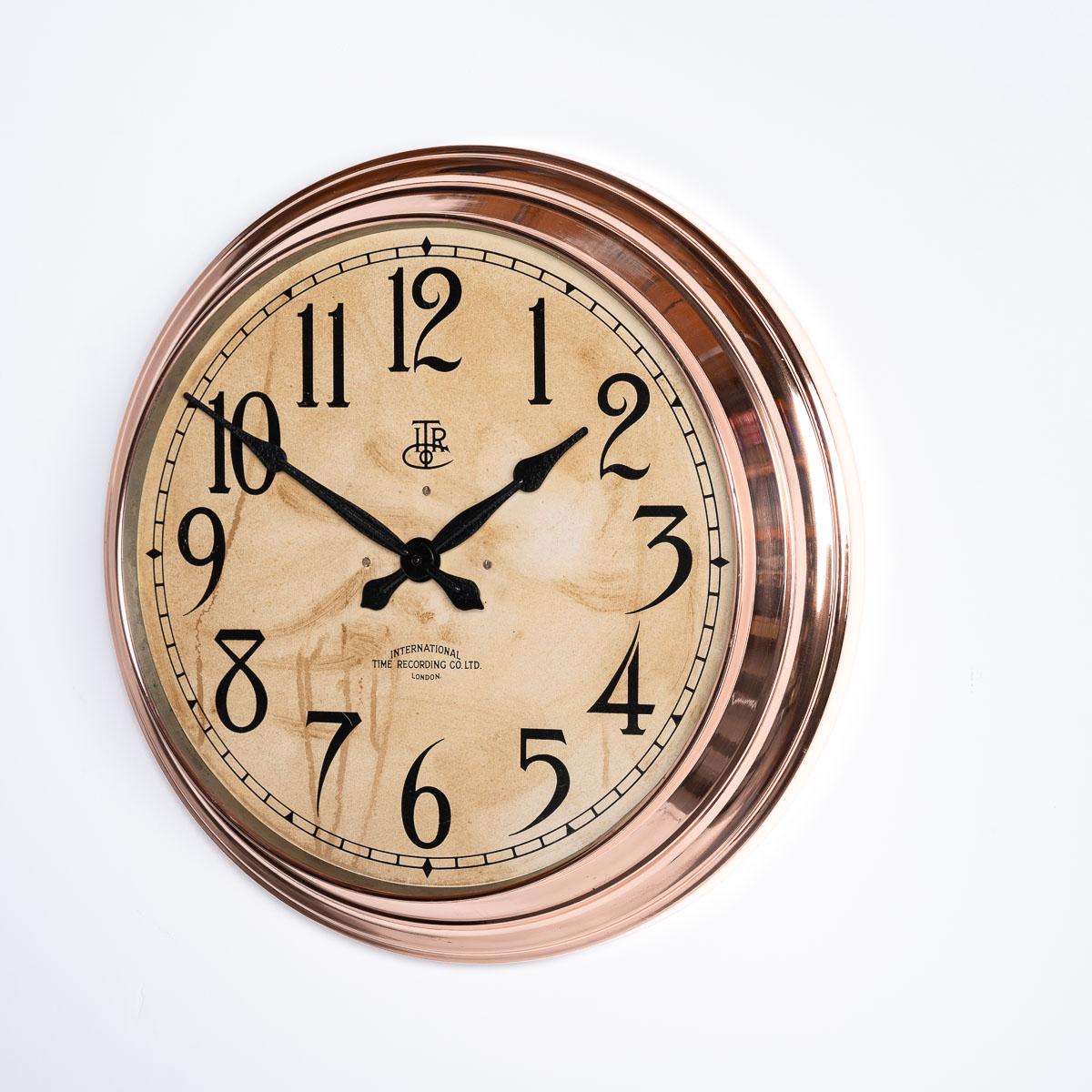 A beautiful and rare example from clock makers International Time Recording Co Ltd circa 1930.

This copper cased industrial clock was originally housed in a boot factory in Leicester, England and was removed by a worker when the factory closed in