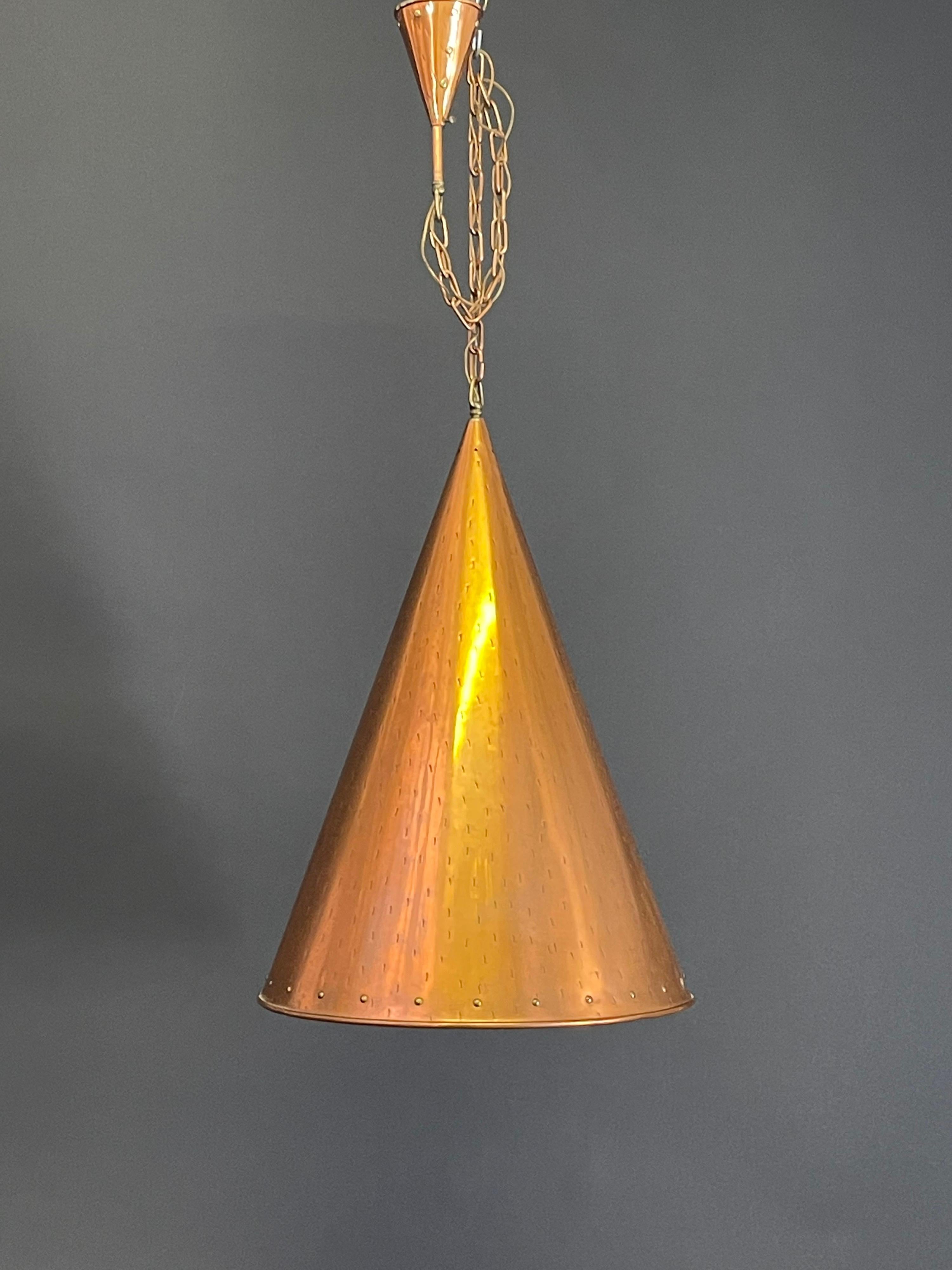 An extra large Mid-Century Modern pendant light by Th.Valentiner, Denmark, circa 1970s.
Made of copper with brass accents hanging on a very long chain.
Socket: 1 x e27 bulb.