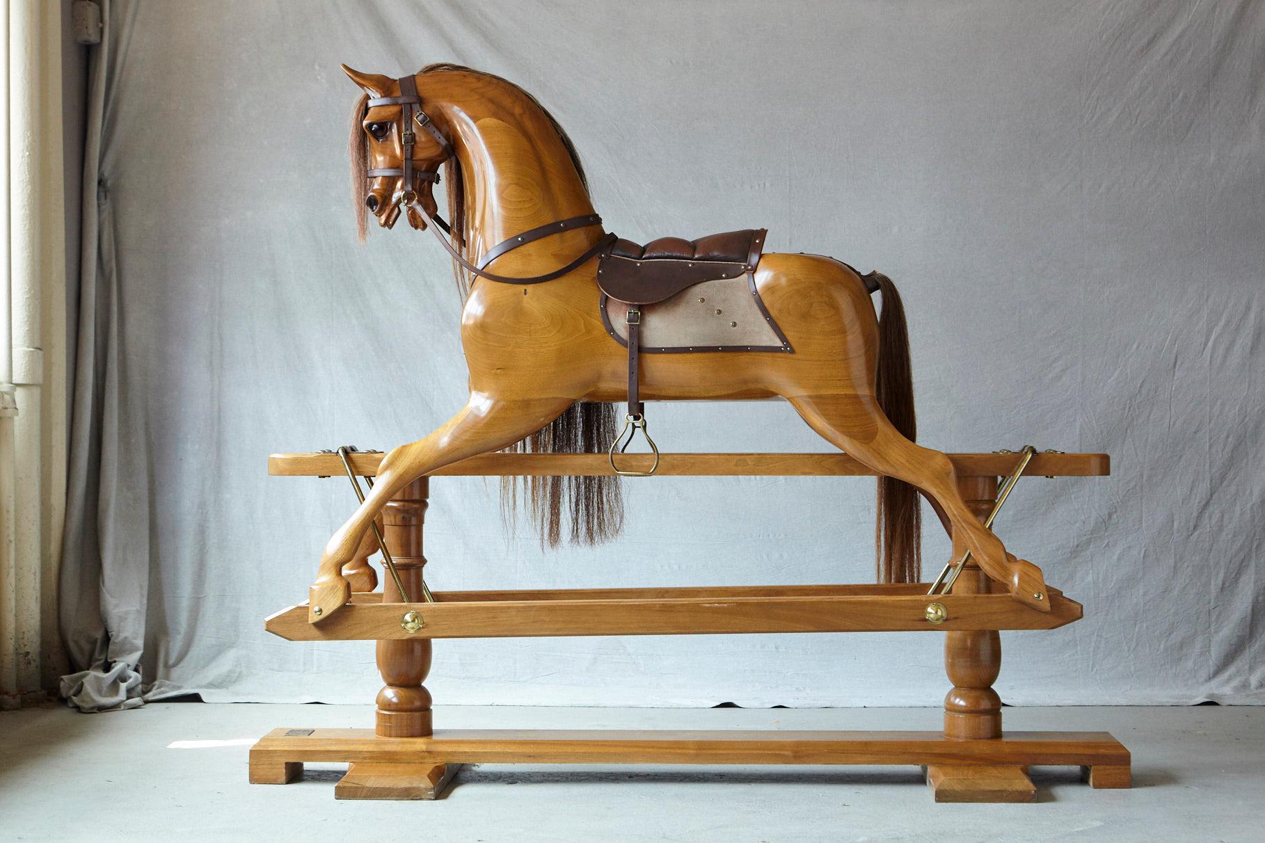 Impressive extra large 70 inches long! Custom made light oak rocking horse, hand-carved by Stevenson Brothers in Bethersden, Kent.
The hand-carved oak horse mounted as a bow rocker, has been polished with natural bees wax to create a hard wearing