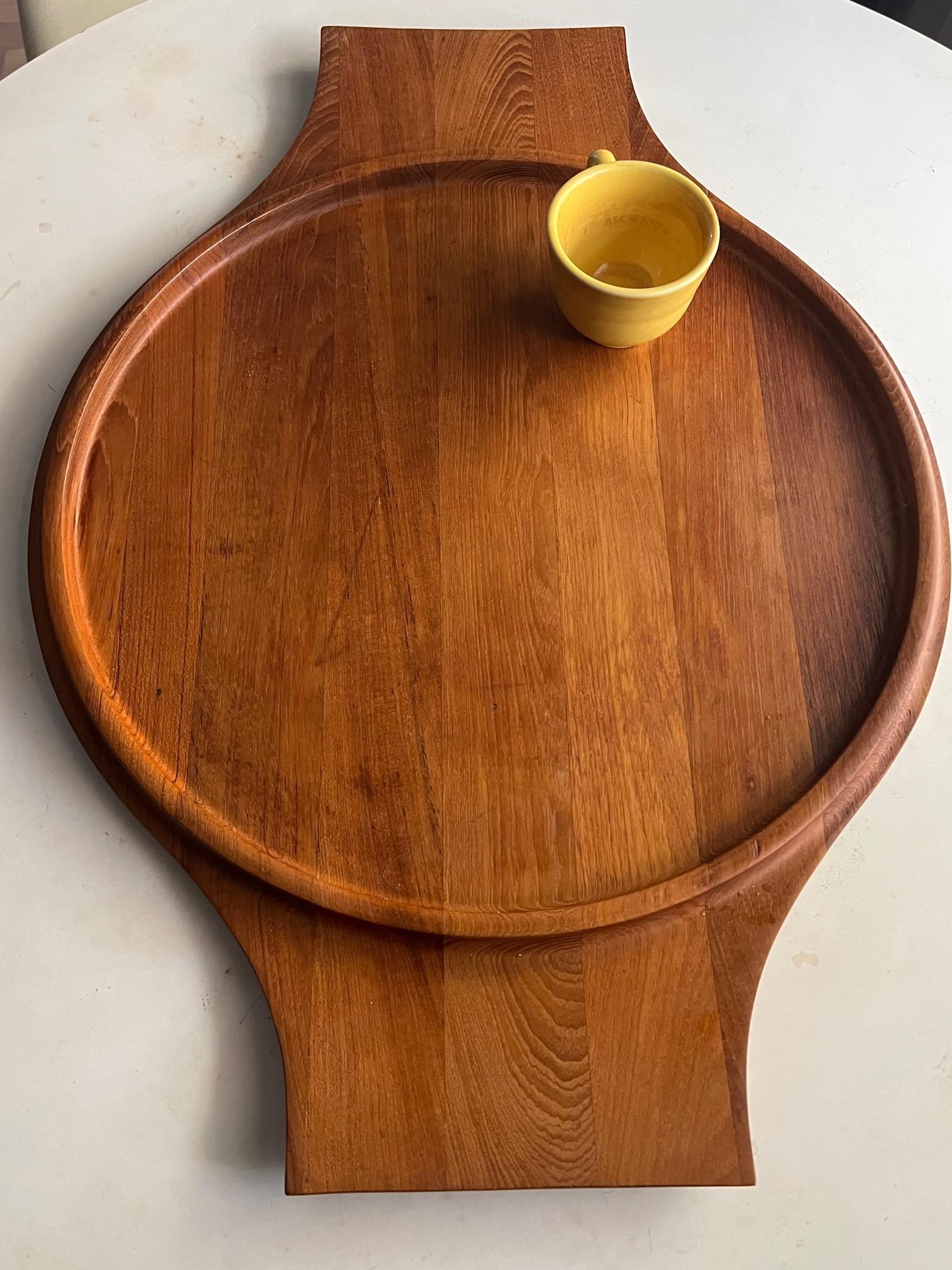 Beautiful serving teak tray by Jens Quistgaard for Dansk, ca' 1960's. This is an extra large-hard to find version at 26
