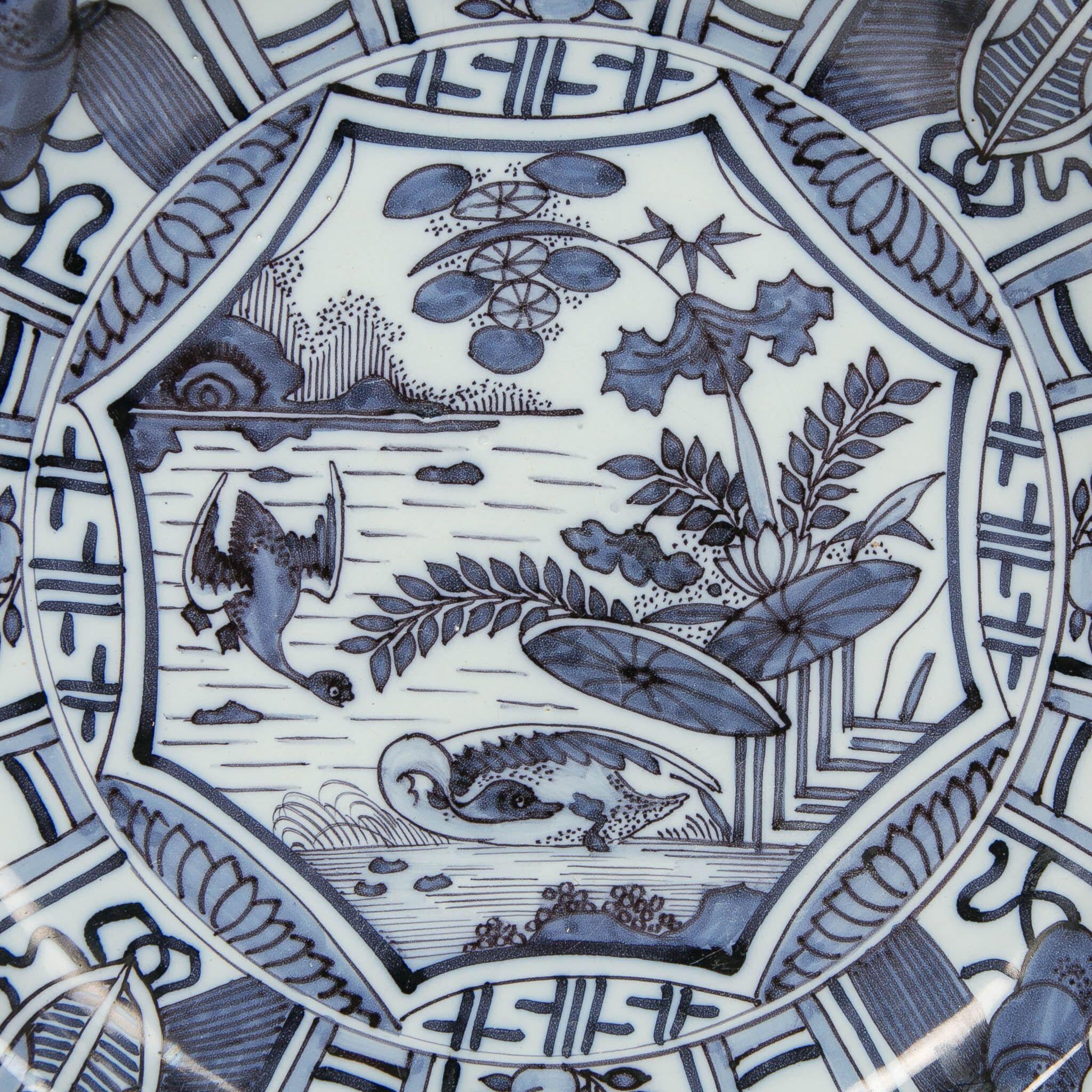 We are proud to offer this beautiful Dutch delft blue and white charger made in the late 17th century, circa 1680-1690. The decoration is a finely painted replica of Chinese Kraak porcelains made in the second half of the 1600s. As imports from