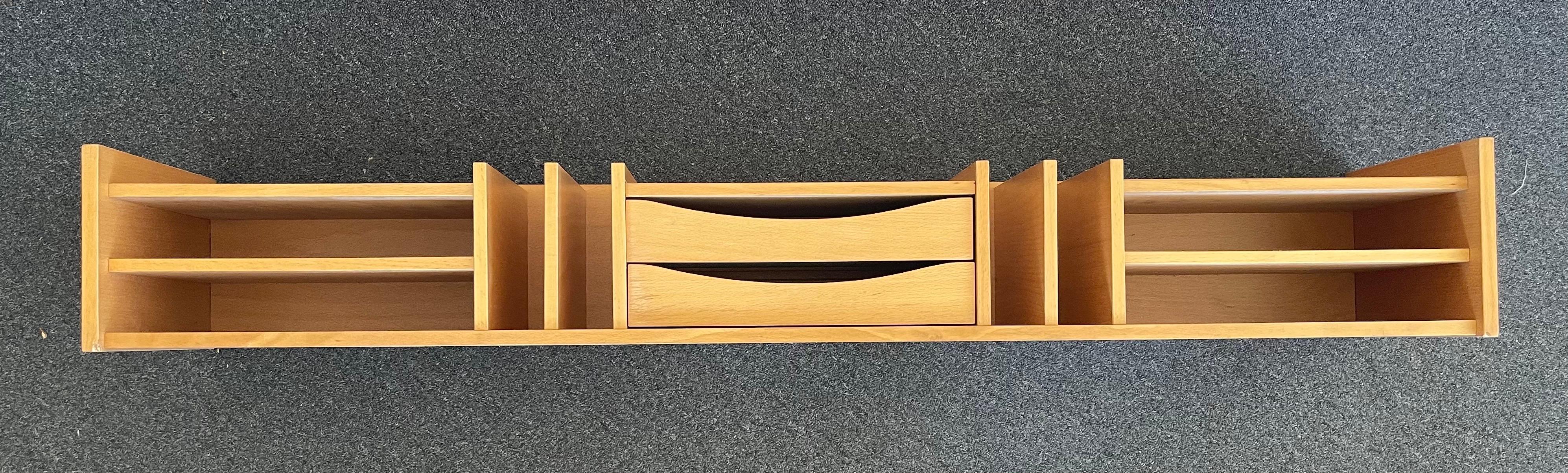 Very functional extra large Danish modern teak desk organizer or letter tray by Pedersen & Hansen, circa 1970s. There are seven horizontal letter trays, four vertical slots and two drawers. The piece has a very light colored finish and is in good