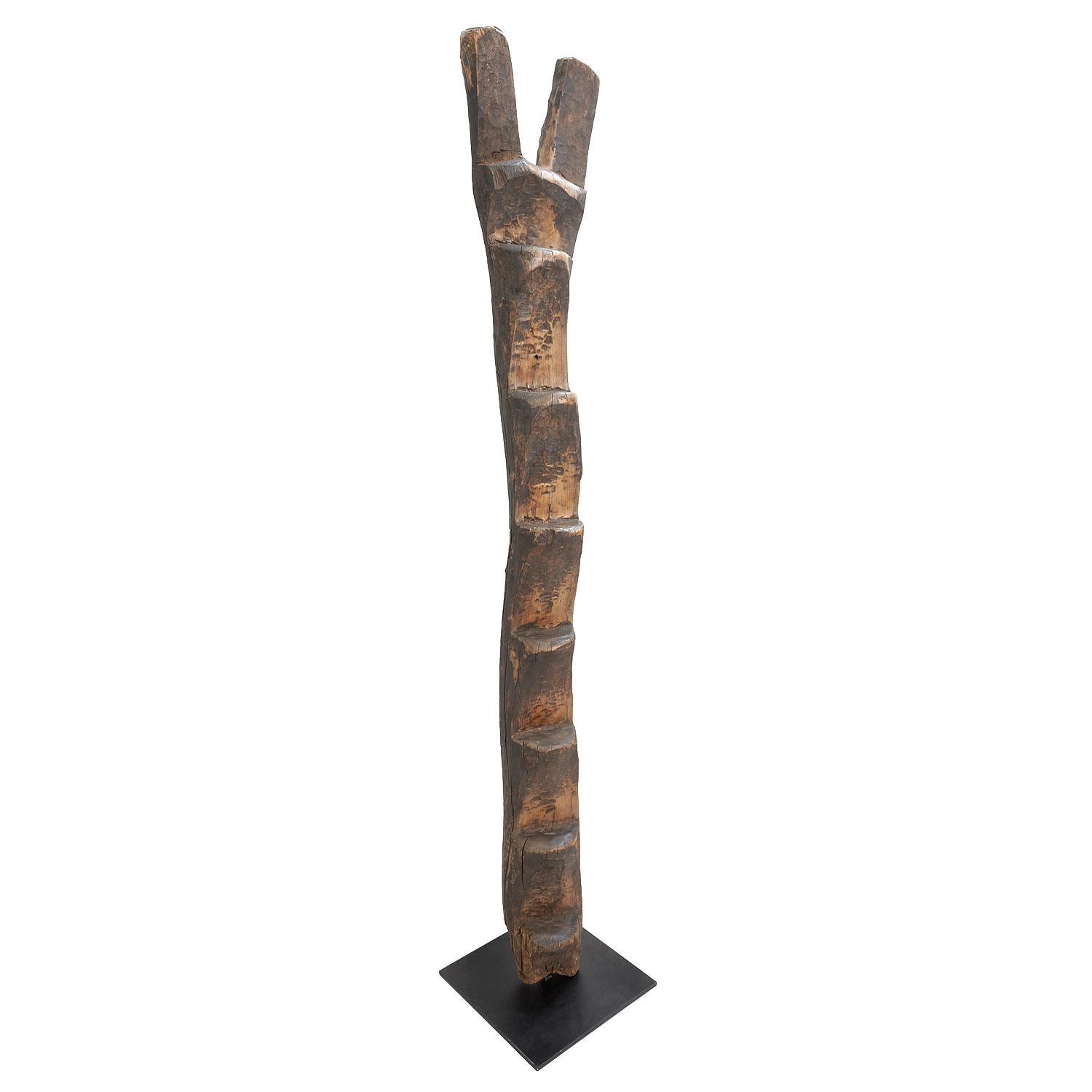 Large Dogon Ladder, Mali

Wood

Early to mid-20th century

Measures: 100 x 17 x 8 in. / 254 x 43 x 20 cm

Mounted on a custom display stand that measures 18 x 18 in. / 46 x 46 cm

With a smooth yet eroded patina, this ladder was likely