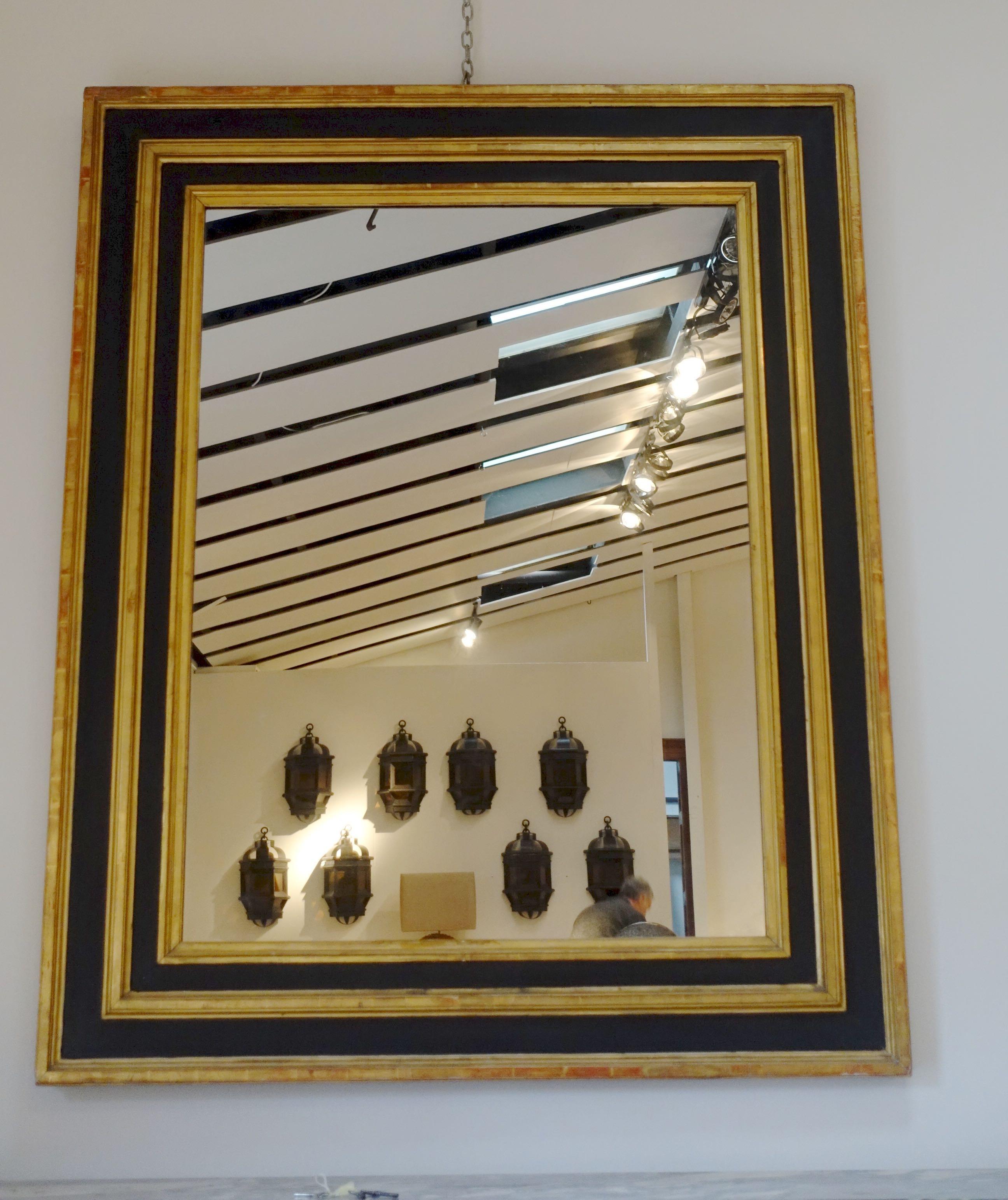 large black and gold mirror