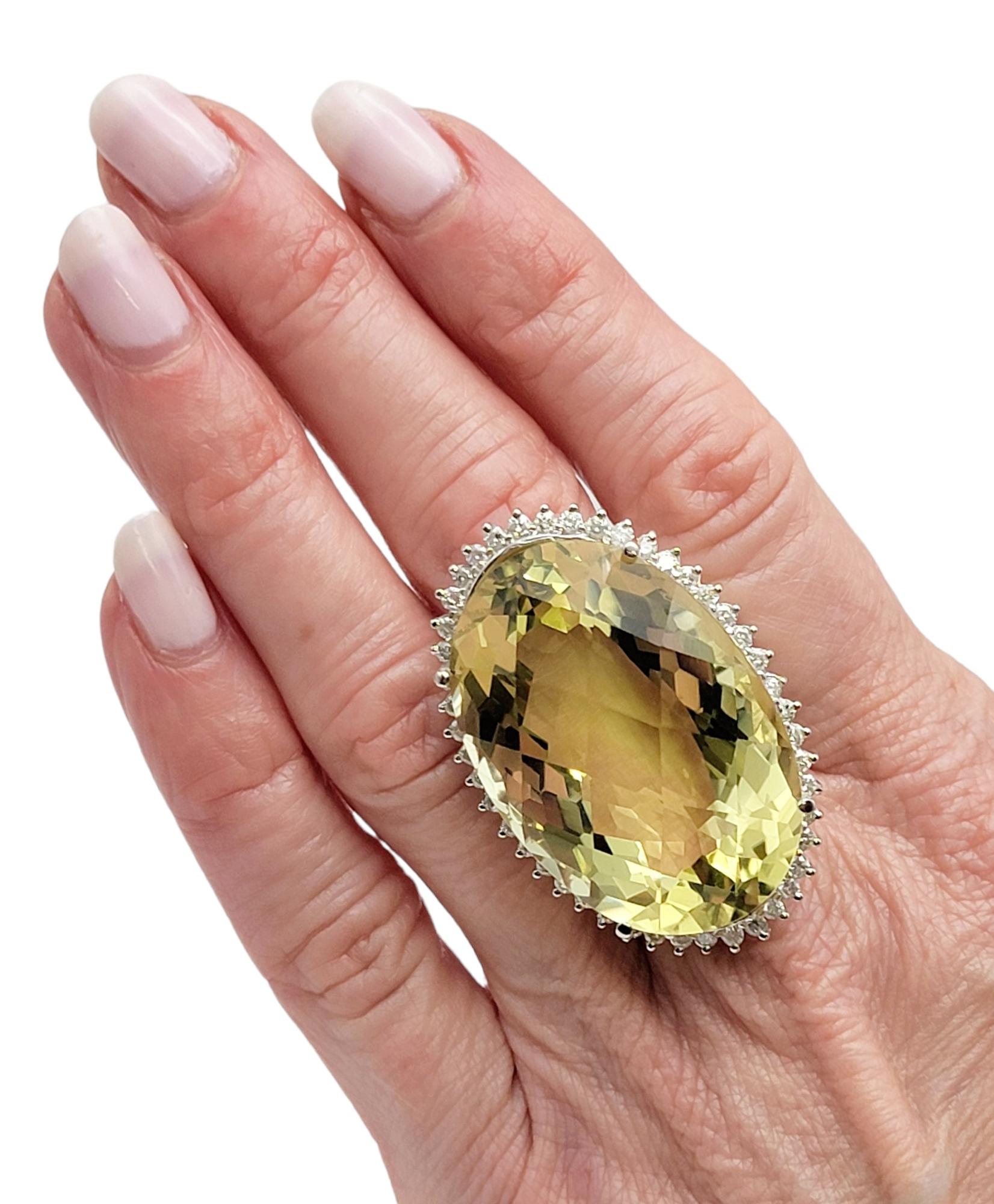 Extra Large Fantasy Oval Cut Lemon Citrine and Diamond Halo Cocktail Ring For Sale 3