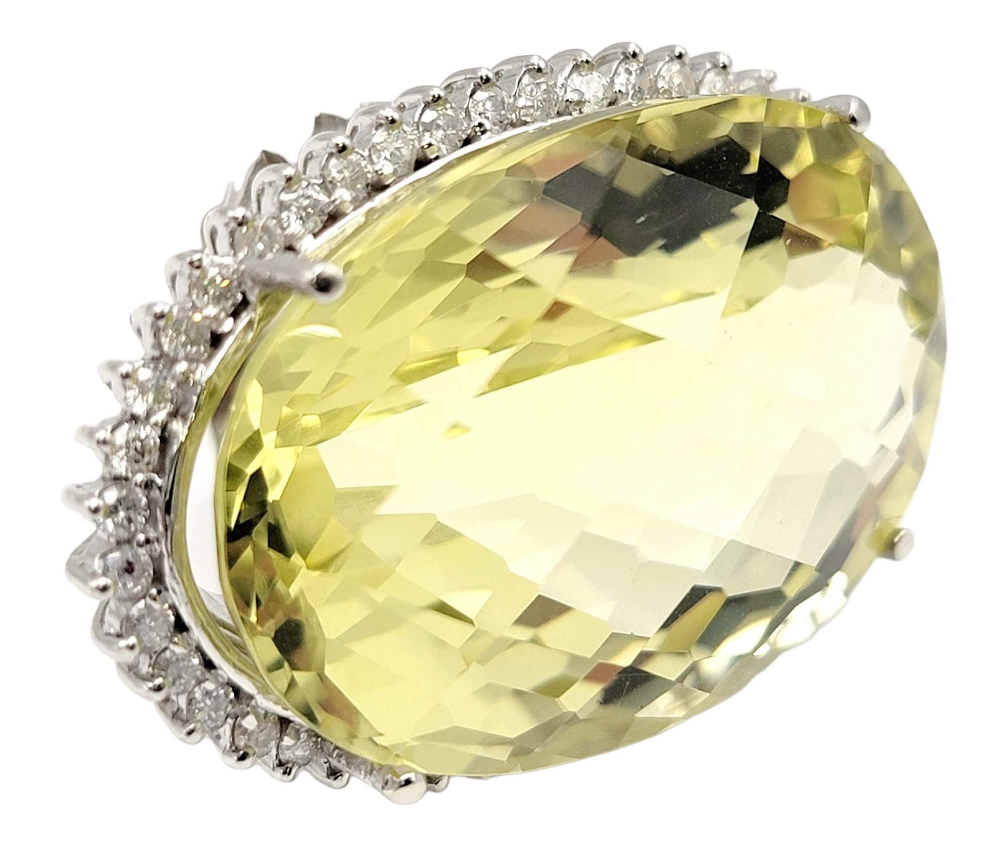 Contemporary Extra Large Fantasy Oval Cut Lemon Citrine and Diamond Halo Cocktail Ring For Sale