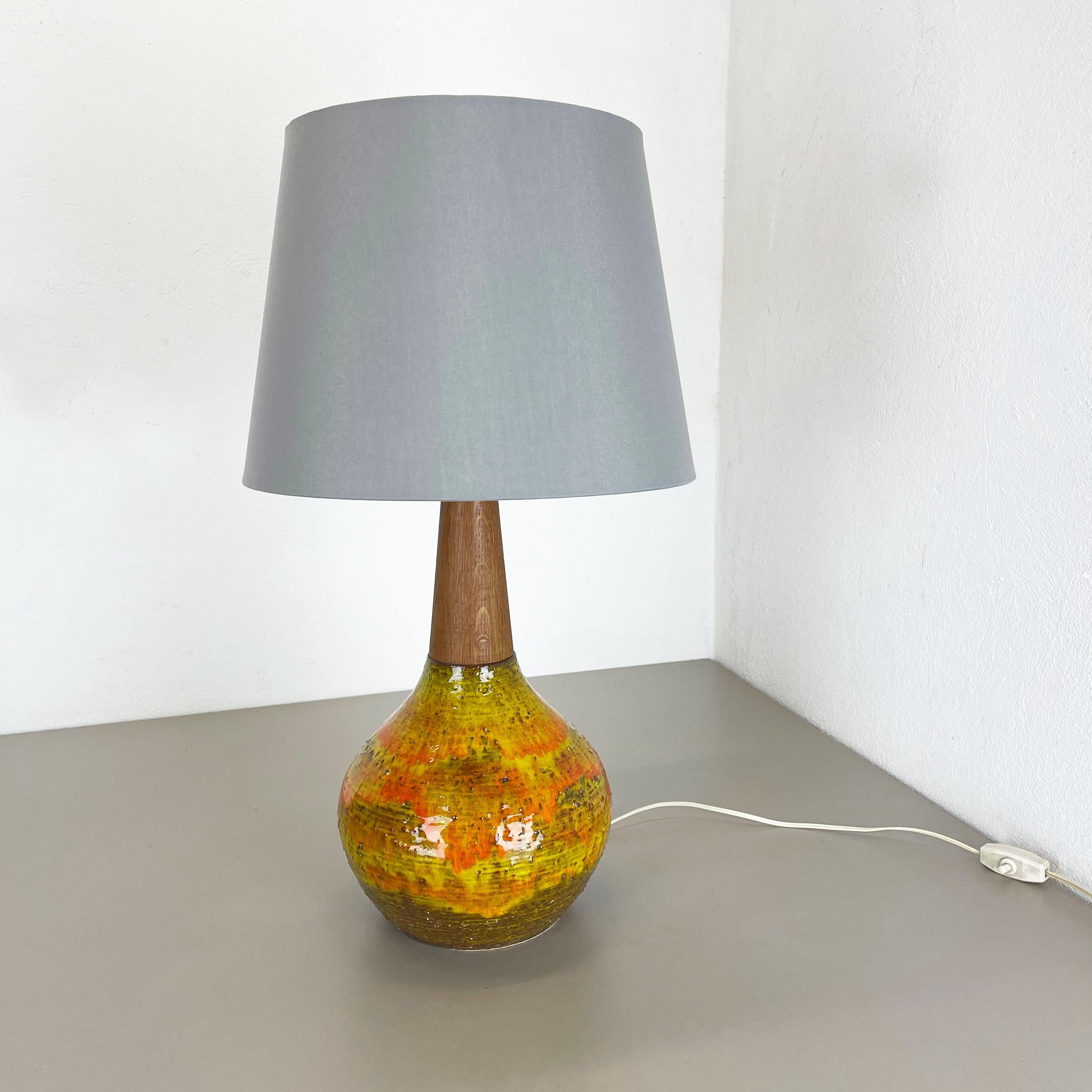 Article:

Fat lava table light base


Producer:

Krösselbach Ceramics, Germany


Decade:

1970s




This original vintage light base was produced in the 1970s by Krösselbach Ceramics in Germany. It is made of ceramic pottery in fat