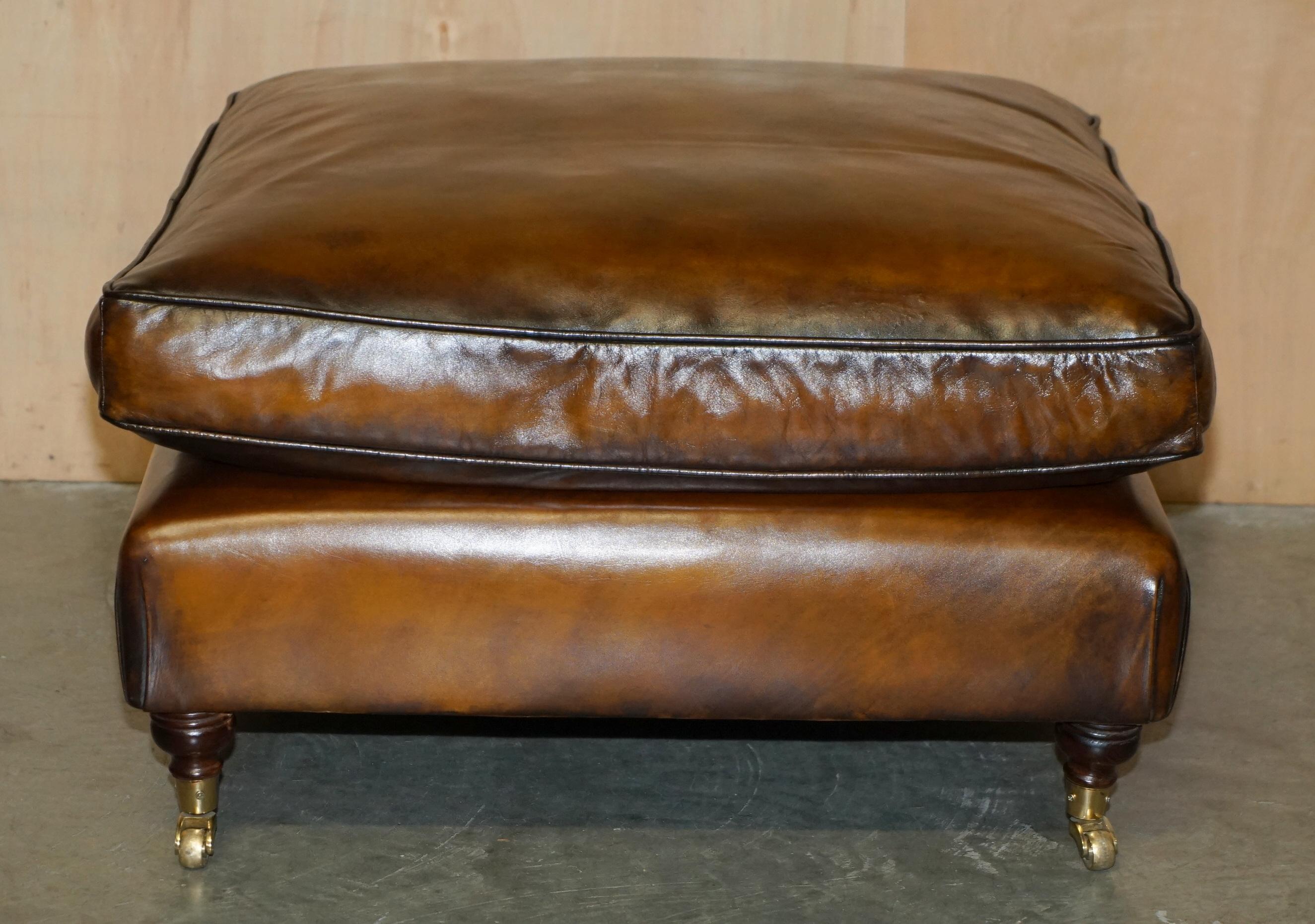 Royal House Antiques

Royal House Antiques is delighted to offer for sale this lovely vintage fully restored hand dyed brown leather, extra large ottoman footstool for four people with overstuffed feather filled cushion which is part of a